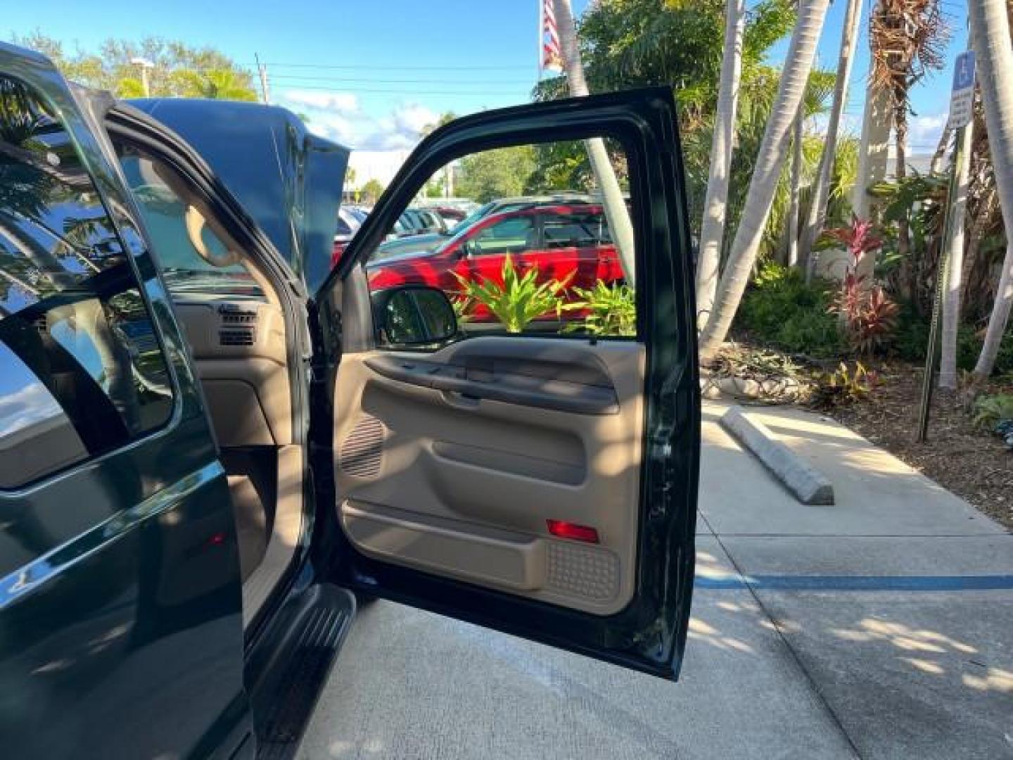 2002 Dark Highland Green Metallic /Medium Parchment Ford Super Duty F-250 7.3 TURBO DIESEL XLT LOW MILES 61,862 (1FTNX20F12E) with an 7.3L DI V8 Turbo-Diesel Power Stroke Engine engine, Automatic transmission, located at 4701 North Dixie Hwy, Pompano Beach, FL, 33064, (954) 422-2889, 26.240938, -80.123474 - OUR WEBPAGE FLORIDACARS1.COM HAS OVER 100 PHOTOS AND FREE CARFAX LINK 2002 FORD F-250 SUPER DUTY LARIAT ROAD READY WORK READY VIN: 1FTNX20F12EB61805 NO ACCIDENTS NO RECALLS 4 DOOR EXTENDED CAB PICKUP POWER SEATS/MIRRORS 7.3L V8 F 7.3L V8 TURBO DIESEL DIESEL LOW MILES 61,862 REAR WHEEL DRIVE 6,9 FT B - Photo#11