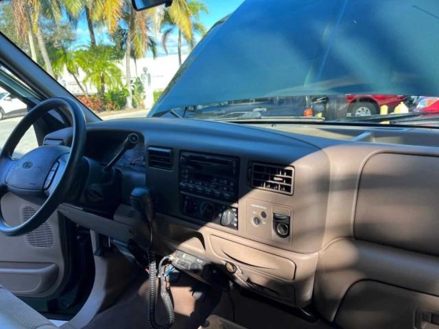 2002 Dark Highland Green Metallic /Medium Parchment Ford Super Duty F-250 7.3 TURBO DIESEL XLT LOW MILES 61,862 (1FTNX20F12E) with an 7.3L DI V8 Turbo-Diesel Power Stroke Engine engine, Automatic transmission, located at 4701 North Dixie Hwy, Pompano Beach, FL, 33064, (954) 422-2889, 26.240938, -80.123474 - OUR WEBPAGE FLORIDACARS1.COM HAS OVER 100 PHOTOS AND FREE CARFAX LINK 2002 FORD F-250 SUPER DUTY LARIAT ROAD READY WORK READY VIN: 1FTNX20F12EB61805 NO ACCIDENTS NO RECALLS 4 DOOR EXTENDED CAB PICKUP POWER SEATS/MIRRORS 7.3L V8 F 7.3L V8 TURBO DIESEL DIESEL LOW MILES 61,862 REAR WHEEL DRIVE 6,9 FT B - Photo#28