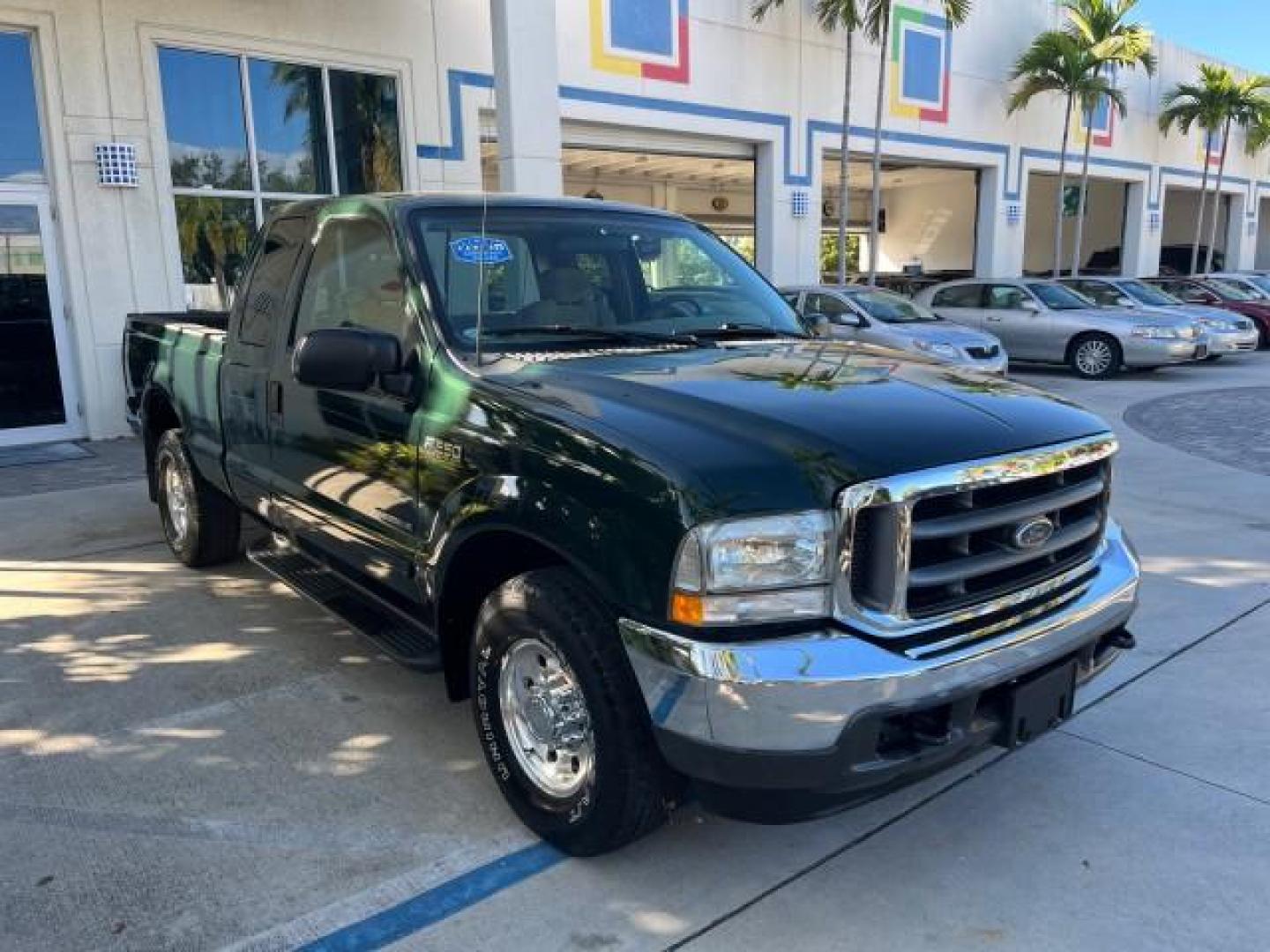 2002 Dark Highland Green Metallic /Medium Parchment Ford Super Duty F-250 7.3 TURBO DIESEL XLT LOW MILES 61,862 (1FTNX20F12E) with an 7.3L DI V8 Turbo-Diesel Power Stroke Engine engine, Automatic transmission, located at 4701 North Dixie Hwy, Pompano Beach, FL, 33064, (954) 422-2889, 26.240938, -80.123474 - OUR WEBPAGE FLORIDACARS1.COM HAS OVER 100 PHOTOS AND FREE CARFAX LINK 2002 FORD F-250 SUPER DUTY LARIAT ROAD READY WORK READY VIN: 1FTNX20F12EB61805 NO ACCIDENTS NO RECALLS 4 DOOR EXTENDED CAB PICKUP POWER SEATS/MIRRORS 7.3L V8 F 7.3L V8 TURBO DIESEL DIESEL LOW MILES 61,862 REAR WHEEL DRIVE 6,9 FT B - Photo#84