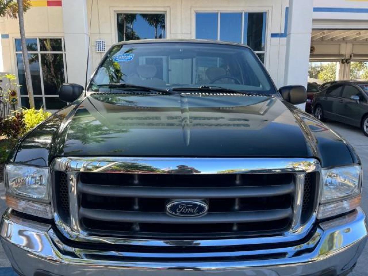 2002 Dark Highland Green Metallic /Medium Parchment Ford Super Duty F-250 7.3 TURBO DIESEL XLT LOW MILES 61,862 (1FTNX20F12E) with an 7.3L DI V8 Turbo-Diesel Power Stroke Engine engine, Automatic transmission, located at 4701 North Dixie Hwy, Pompano Beach, FL, 33064, (954) 422-2889, 26.240938, -80.123474 - OUR WEBPAGE FLORIDACARS1.COM HAS OVER 100 PHOTOS AND FREE CARFAX LINK 2002 FORD F-250 SUPER DUTY LARIAT ROAD READY WORK READY VIN: 1FTNX20F12EB61805 NO ACCIDENTS NO RECALLS 4 DOOR EXTENDED CAB PICKUP POWER SEATS/MIRRORS 7.3L V8 F 7.3L V8 TURBO DIESEL DIESEL LOW MILES 61,862 REAR WHEEL DRIVE 6,9 FT B - Photo#88