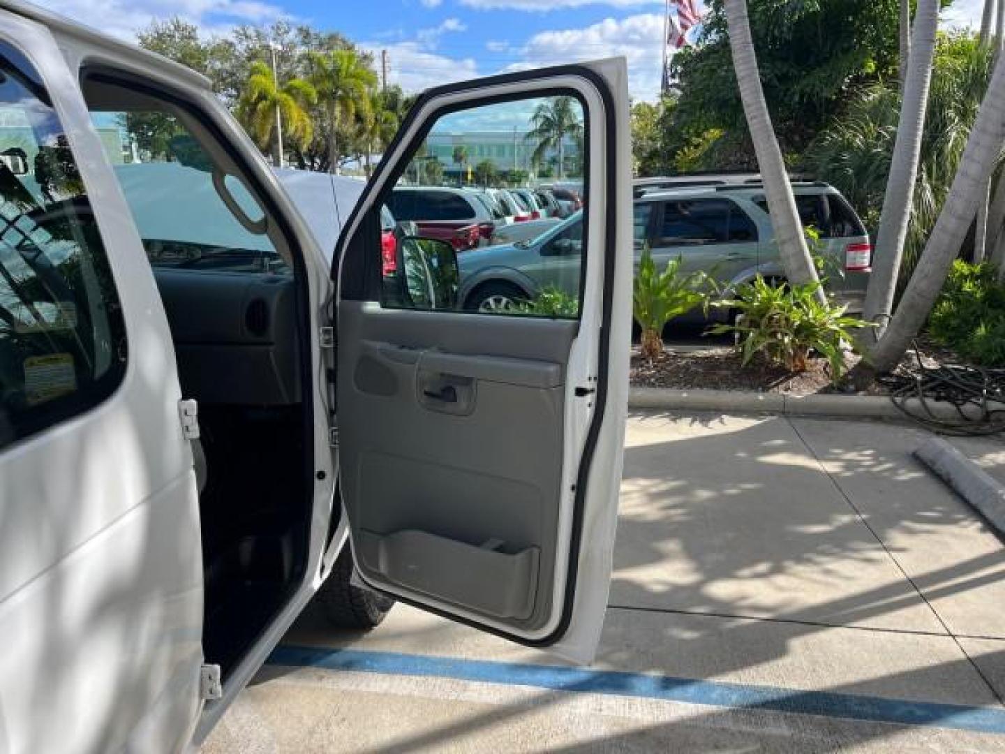 2007 Oxford White /Medium Flint Ford Econoline Cargo Van CARGO LOW MILES 53,152 (1FTNE14W37D) with an 4.6L SOHC EFI V8 Triton Engine engine, Automatic transmission, located at 4701 North Dixie Hwy, Pompano Beach, FL, 33064, (954) 422-2889, 26.240938, -80.123474 - OUR WEBPAGE FLORIDACARS1.COM HAS OVER 100 PHOTOS AND FREE CARFAX LINK 2007 FORD E-SERIES E-150 ROAD READY WORK READY VIN: 1FTNE14W37DA01349 NO ACCIDENTS 4.6L V8 VAN NO RECALLS 4.6L V8 F SOHC LOW MILES 53,152 GASOLINE 8 SERVICE RECORDS REAR WHEEL DRIVE POWER MIRRORS Electronic Braking System Front Bu - Photo#11