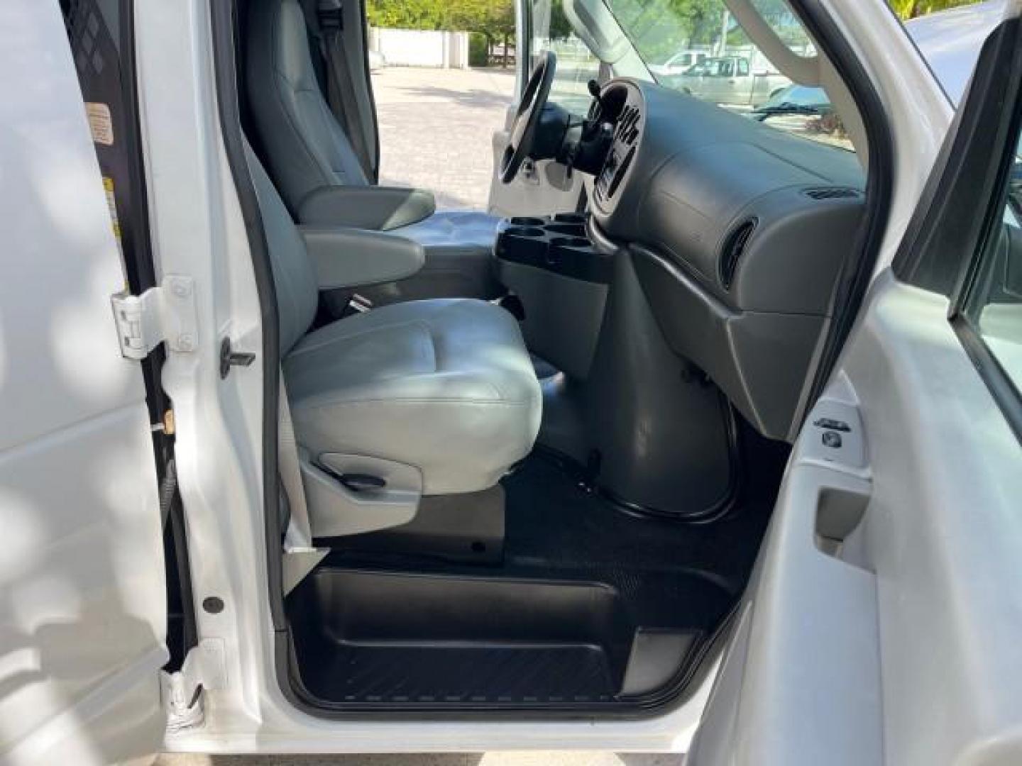 2007 Oxford White /Medium Flint Ford Econoline Cargo Van CARGO LOW MILES 53,152 (1FTNE14W37D) with an 4.6L SOHC EFI V8 Triton Engine engine, Automatic transmission, located at 4701 North Dixie Hwy, Pompano Beach, FL, 33064, (954) 422-2889, 26.240938, -80.123474 - OUR WEBPAGE FLORIDACARS1.COM HAS OVER 100 PHOTOS AND FREE CARFAX LINK 2007 FORD E-SERIES E-150 ROAD READY WORK READY VIN: 1FTNE14W37DA01349 NO ACCIDENTS 4.6L V8 VAN NO RECALLS 4.6L V8 F SOHC LOW MILES 53,152 GASOLINE 8 SERVICE RECORDS REAR WHEEL DRIVE POWER MIRRORS Electronic Braking System Front Bu - Photo#12