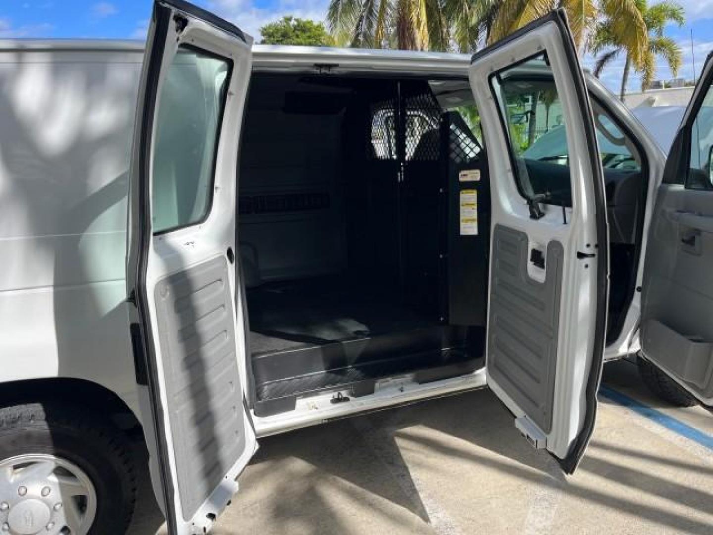 2007 Oxford White /Medium Flint Ford Econoline Cargo Van CARGO LOW MILES 53,152 (1FTNE14W37D) with an 4.6L SOHC EFI V8 Triton Engine engine, Automatic transmission, located at 4701 North Dixie Hwy, Pompano Beach, FL, 33064, (954) 422-2889, 26.240938, -80.123474 - OUR WEBPAGE FLORIDACARS1.COM HAS OVER 100 PHOTOS AND FREE CARFAX LINK 2007 FORD E-SERIES E-150 ROAD READY WORK READY VIN: 1FTNE14W37DA01349 NO ACCIDENTS 4.6L V8 VAN NO RECALLS 4.6L V8 F SOHC LOW MILES 53,152 GASOLINE 8 SERVICE RECORDS REAR WHEEL DRIVE POWER MIRRORS Electronic Braking System Front Bu - Photo#13