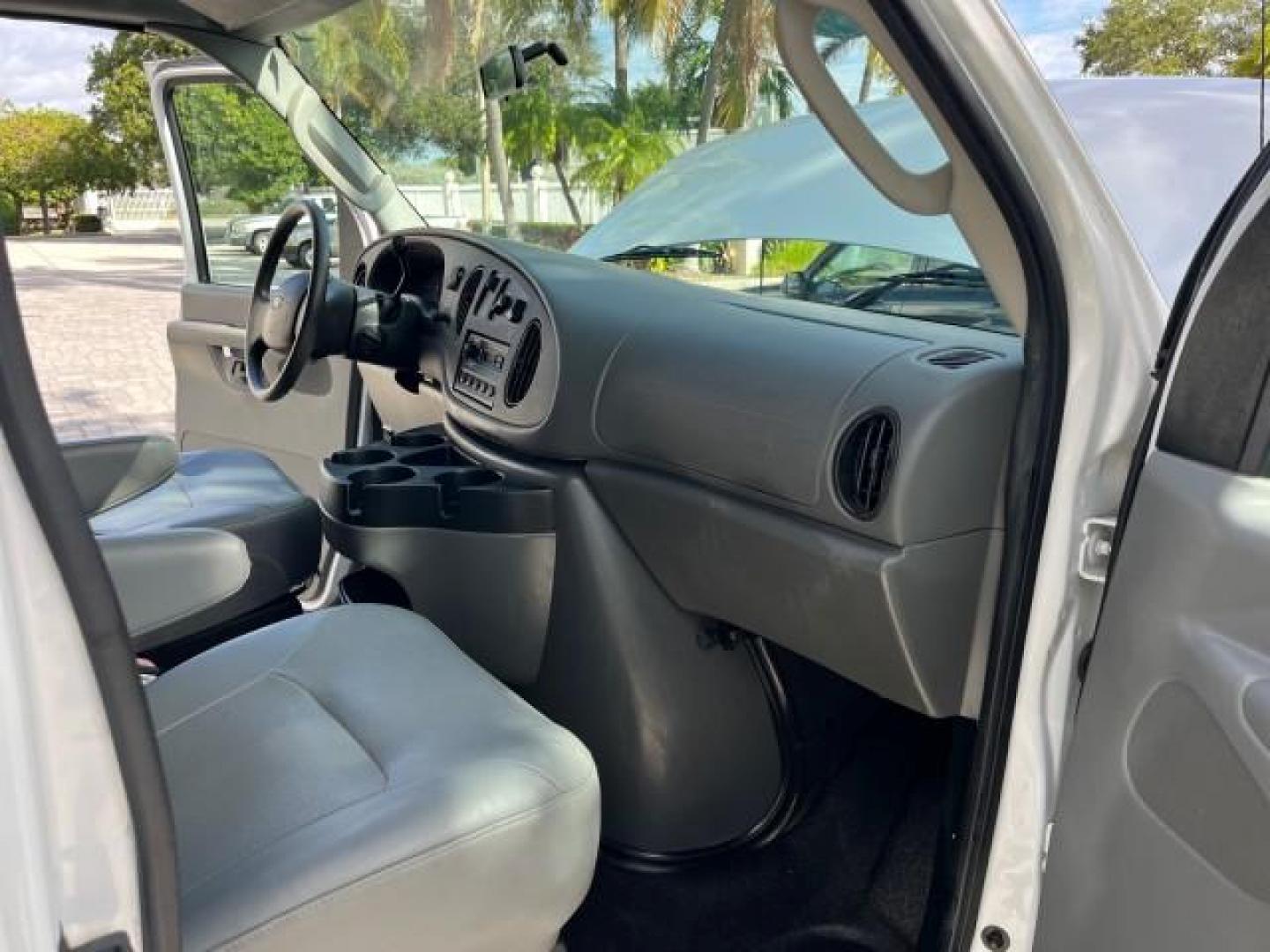 2007 Oxford White /Medium Flint Ford Econoline Cargo Van CARGO LOW MILES 53,152 (1FTNE14W37D) with an 4.6L SOHC EFI V8 Triton Engine engine, Automatic transmission, located at 4701 North Dixie Hwy, Pompano Beach, FL, 33064, (954) 422-2889, 26.240938, -80.123474 - OUR WEBPAGE FLORIDACARS1.COM HAS OVER 100 PHOTOS AND FREE CARFAX LINK 2007 FORD E-SERIES E-150 ROAD READY WORK READY VIN: 1FTNE14W37DA01349 NO ACCIDENTS 4.6L V8 VAN NO RECALLS 4.6L V8 F SOHC LOW MILES 53,152 GASOLINE 8 SERVICE RECORDS REAR WHEEL DRIVE POWER MIRRORS Electronic Braking System Front Bu - Photo#25