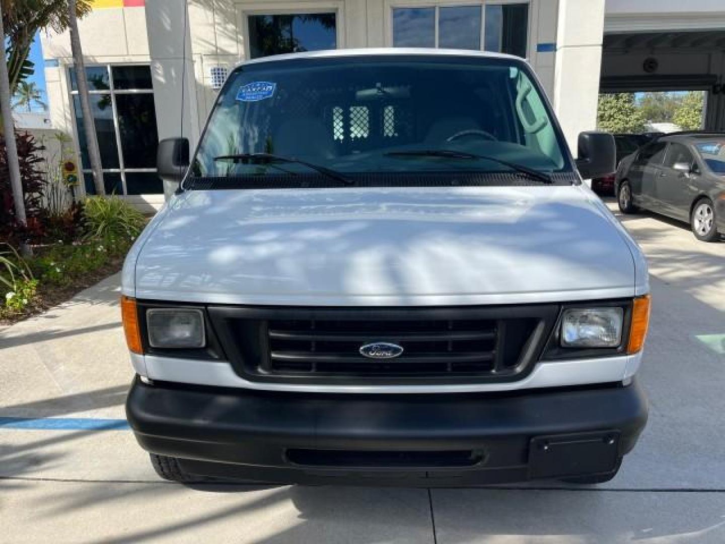 2007 Oxford White /Medium Flint Ford Econoline Cargo Van CARGO LOW MILES 53,152 (1FTNE14W37D) with an 4.6L SOHC EFI V8 Triton Engine engine, Automatic transmission, located at 4701 North Dixie Hwy, Pompano Beach, FL, 33064, (954) 422-2889, 26.240938, -80.123474 - OUR WEBPAGE FLORIDACARS1.COM HAS OVER 100 PHOTOS AND FREE CARFAX LINK 2007 FORD E-SERIES E-150 ROAD READY WORK READY VIN: 1FTNE14W37DA01349 NO ACCIDENTS 4.6L V8 VAN NO RECALLS 4.6L V8 F SOHC LOW MILES 53,152 GASOLINE 8 SERVICE RECORDS REAR WHEEL DRIVE POWER MIRRORS Electronic Braking System Front Bu - Photo#77