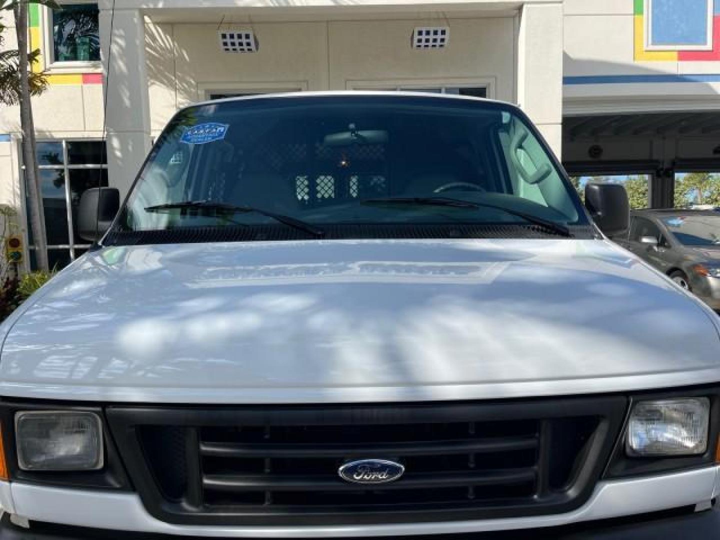 2007 Oxford White /Medium Flint Ford Econoline Cargo Van CARGO LOW MILES 53,152 (1FTNE14W37D) with an 4.6L SOHC EFI V8 Triton Engine engine, Automatic transmission, located at 4701 North Dixie Hwy, Pompano Beach, FL, 33064, (954) 422-2889, 26.240938, -80.123474 - OUR WEBPAGE FLORIDACARS1.COM HAS OVER 100 PHOTOS AND FREE CARFAX LINK 2007 FORD E-SERIES E-150 ROAD READY WORK READY VIN: 1FTNE14W37DA01349 NO ACCIDENTS 4.6L V8 VAN NO RECALLS 4.6L V8 F SOHC LOW MILES 53,152 GASOLINE 8 SERVICE RECORDS REAR WHEEL DRIVE POWER MIRRORS Electronic Braking System Front Bu - Photo#83