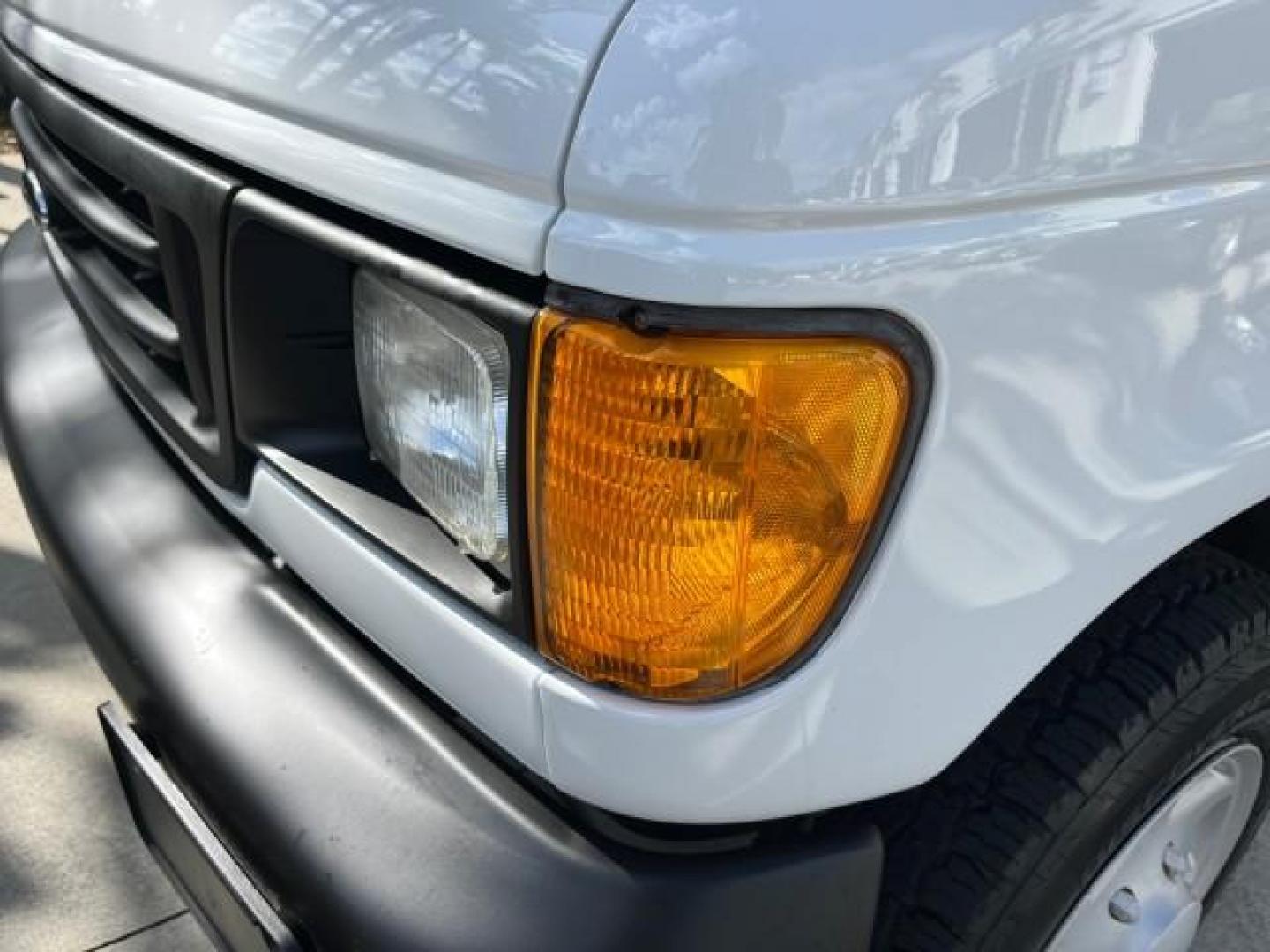 2007 Oxford White /Medium Flint Ford Econoline Cargo Van CARGO LOW MILES 53,152 (1FTNE14W37D) with an 4.6L SOHC EFI V8 Triton Engine engine, Automatic transmission, located at 4701 North Dixie Hwy, Pompano Beach, FL, 33064, (954) 422-2889, 26.240938, -80.123474 - OUR WEBPAGE FLORIDACARS1.COM HAS OVER 100 PHOTOS AND FREE CARFAX LINK 2007 FORD E-SERIES E-150 ROAD READY WORK READY VIN: 1FTNE14W37DA01349 NO ACCIDENTS 4.6L V8 VAN NO RECALLS 4.6L V8 F SOHC LOW MILES 53,152 GASOLINE 8 SERVICE RECORDS REAR WHEEL DRIVE POWER MIRRORS Electronic Braking System Front Bu - Photo#85