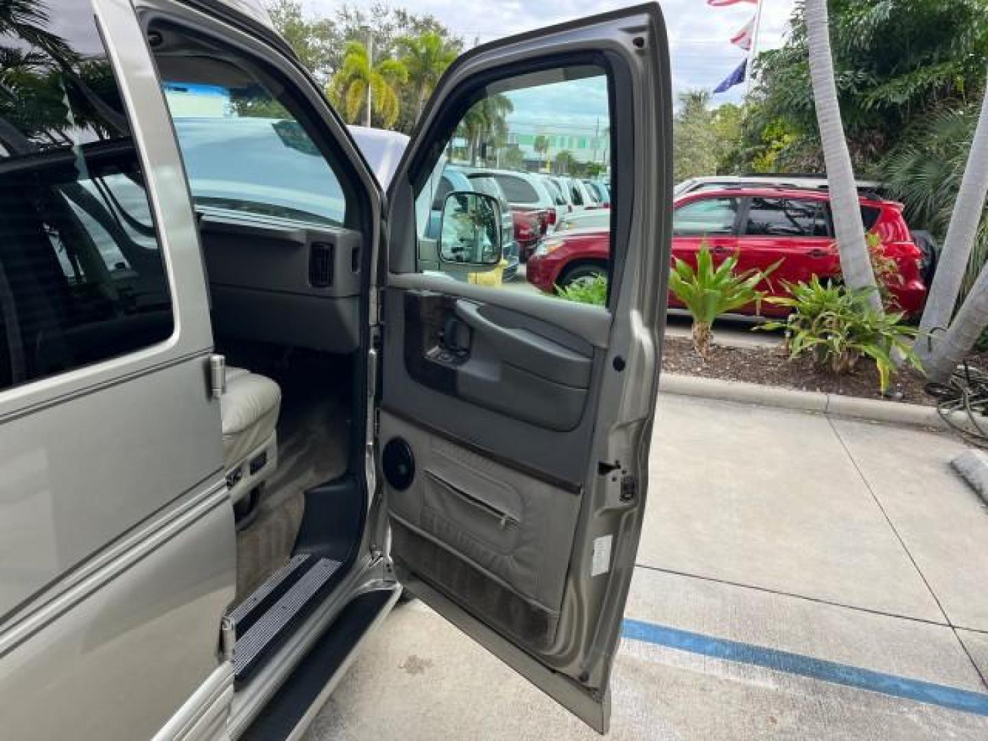 2003 Light Pewter Metallic /Medium Pewter Chevrolet Express conv Van HI TOP EXPLORER CONV LO MI 84,354 (1GBFG15T331) with an 5.3L Vortec 5300 V8 SFI Engine engine, Automatic transmission, located at 4701 North Dixie Hwy, Pompano Beach, FL, 33064, (954) 422-2889, 26.240938, -80.123474 - OUR WEBPAGE FLORIDACARS1.COM HAS OVER 100 PHOTOS AND FREE CARFAX LINK 2003 CHEVROLET EXPRESS G1500 ROAD READY 5.3L V8 VIN: 1GBFG15T331233422 NO ACCIDENTS NO RECALLS VAN LOW MILES 84,354 5.3L V8 F OHV 3 ROW POWER LEATHER SEATS GASOLINE TV DVD VIDEO REAR WHEEL DRIVE $64,289 NEW POWER MIRRORS Alloy Whe - Photo#11