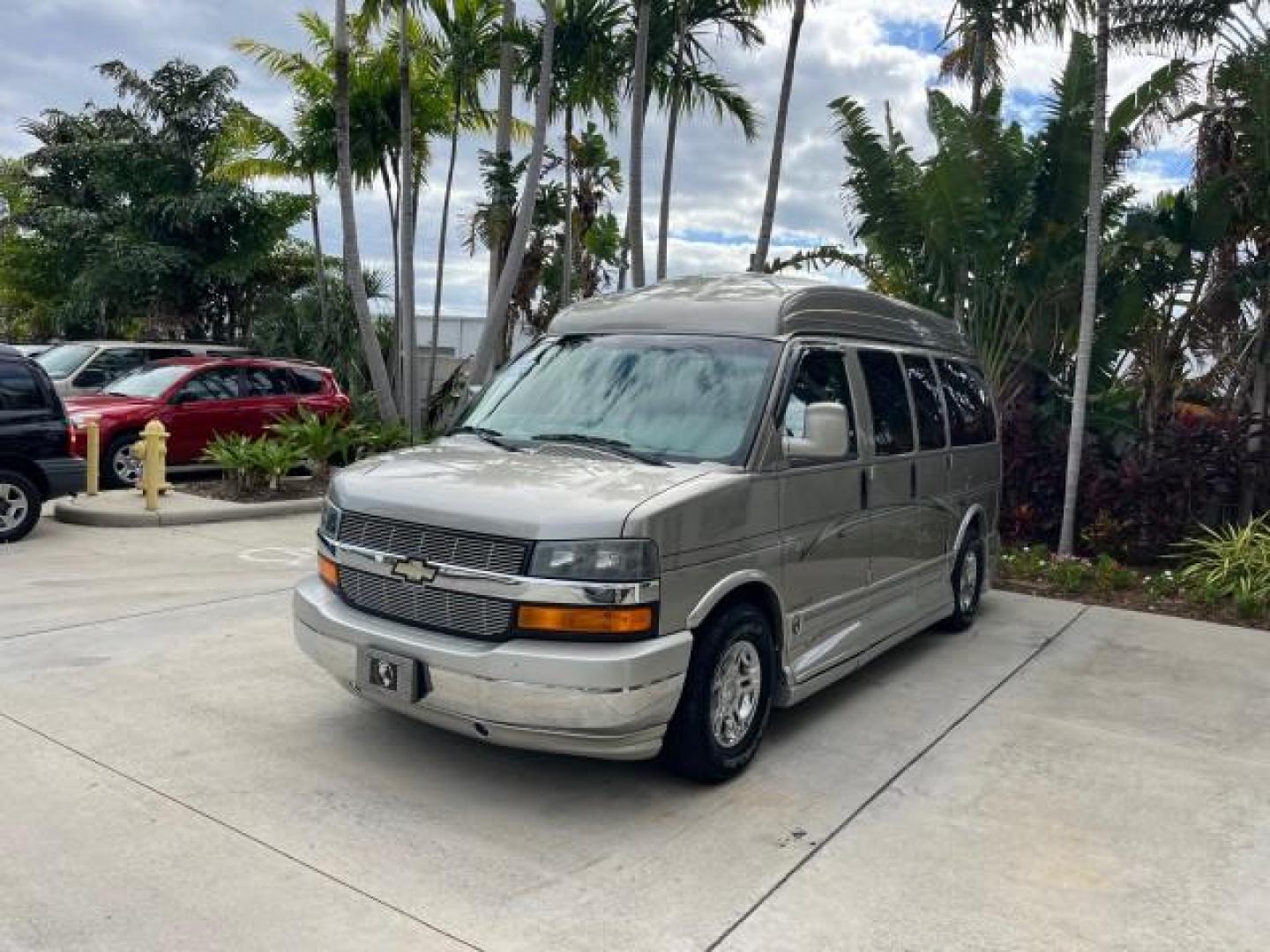 2003 Light Pewter Metallic /Medium Pewter Chevrolet Express conv Van HI TOP EXPLORER CONV LO MI 84,354 (1GBFG15T331) with an 5.3L Vortec 5300 V8 SFI Engine engine, Automatic transmission, located at 4701 North Dixie Hwy, Pompano Beach, FL, 33064, (954) 422-2889, 26.240938, -80.123474 - OUR WEBPAGE FLORIDACARS1.COM HAS OVER 100 PHOTOS AND FREE CARFAX LINK 2003 CHEVROLET EXPRESS G1500 ROAD READY 5.3L V8 VIN: 1GBFG15T331233422 NO ACCIDENTS NO RECALLS VAN LOW MILES 84,354 5.3L V8 F OHV 3 ROW POWER LEATHER SEATS GASOLINE TV DVD VIDEO REAR WHEEL DRIVE $64,289 NEW POWER MIRRORS Alloy Whe - Photo#3