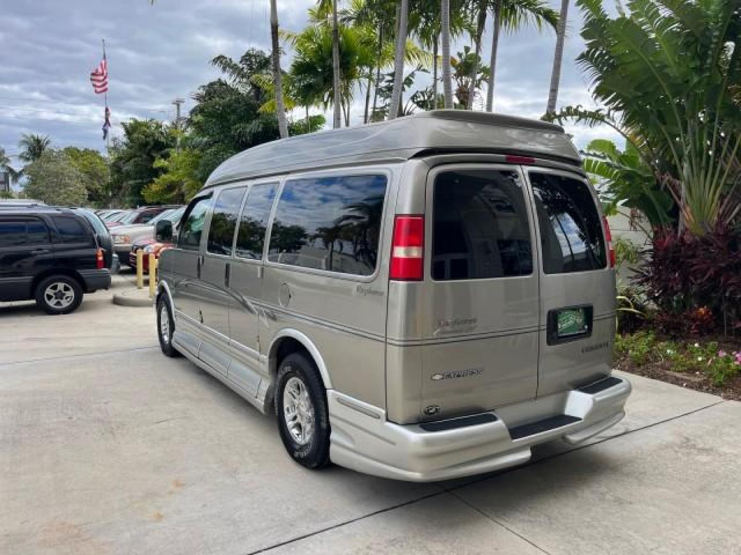 2003 Light Pewter Metallic /Medium Pewter Chevrolet Express conv Van HI TOP EXPLORER CONV LO MI 84,354 (1GBFG15T331) with an 5.3L Vortec 5300 V8 SFI Engine engine, Automatic transmission, located at 4701 North Dixie Hwy, Pompano Beach, FL, 33064, (954) 422-2889, 26.240938, -80.123474 - OUR WEBPAGE FLORIDACARS1.COM HAS OVER 100 PHOTOS AND FREE CARFAX LINK 2003 CHEVROLET EXPRESS G1500 ROAD READY 5.3L V8 VIN: 1GBFG15T331233422 NO ACCIDENTS NO RECALLS VAN LOW MILES 84,354 5.3L V8 F OHV 3 ROW POWER LEATHER SEATS GASOLINE TV DVD VIDEO REAR WHEEL DRIVE $64,289 NEW POWER MIRRORS Alloy Whe - Photo#5