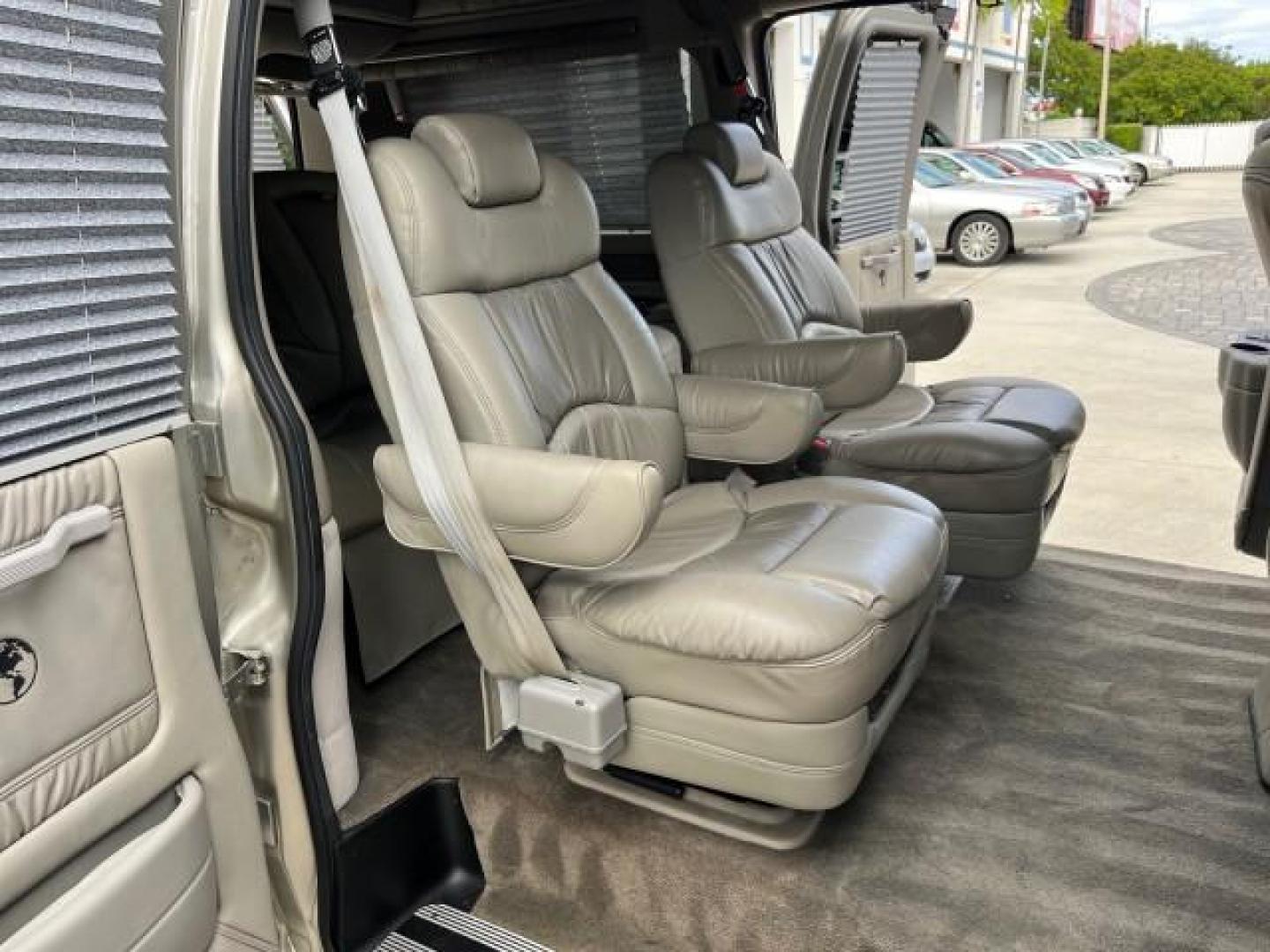 2003 Light Pewter Metallic /Medium Pewter Chevrolet Express conv Van HI TOP EXPLORER CONV LO MI 84,354 (1GBFG15T331) with an 5.3L Vortec 5300 V8 SFI Engine engine, Automatic transmission, located at 4701 North Dixie Hwy, Pompano Beach, FL, 33064, (954) 422-2889, 26.240938, -80.123474 - OUR WEBPAGE FLORIDACARS1.COM HAS OVER 100 PHOTOS AND FREE CARFAX LINK 2003 CHEVROLET EXPRESS G1500 ROAD READY 5.3L V8 VIN: 1GBFG15T331233422 NO ACCIDENTS NO RECALLS VAN LOW MILES 84,354 5.3L V8 F OHV 3 ROW POWER LEATHER SEATS GASOLINE TV DVD VIDEO REAR WHEEL DRIVE $64,289 NEW POWER MIRRORS Alloy Whe - Photo#68