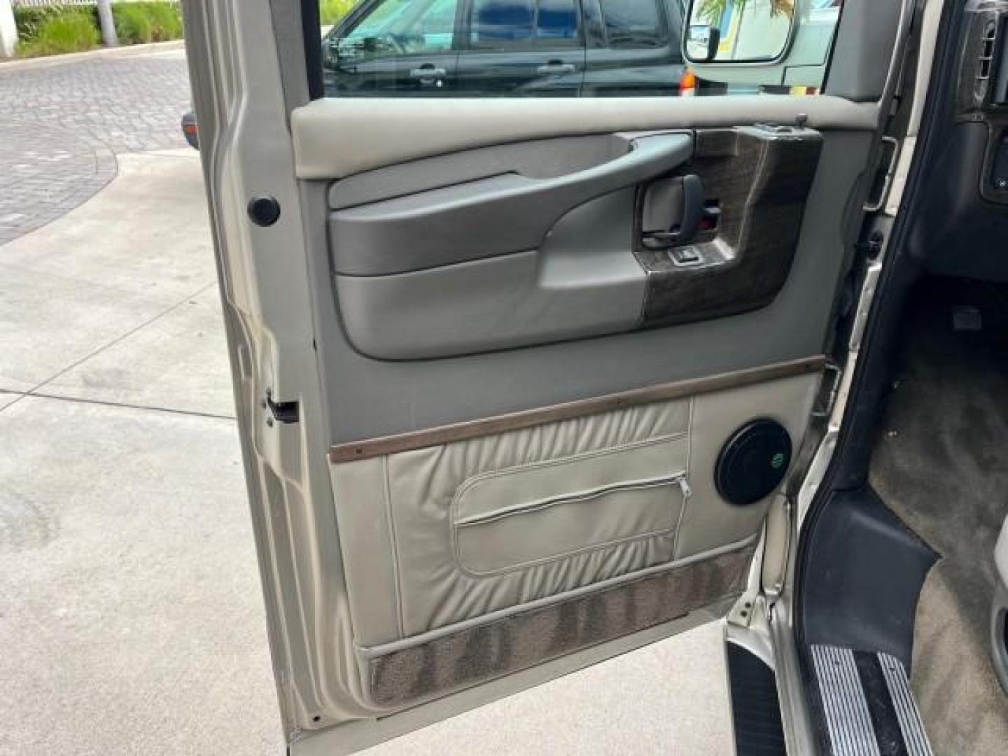 2003 Light Pewter Metallic /Medium Pewter Chevrolet Express conv Van HI TOP EXPLORER CONV LO MI 84,354 (1GBFG15T331) with an 5.3L Vortec 5300 V8 SFI Engine engine, Automatic transmission, located at 4701 North Dixie Hwy, Pompano Beach, FL, 33064, (954) 422-2889, 26.240938, -80.123474 - OUR WEBPAGE FLORIDACARS1.COM HAS OVER 100 PHOTOS AND FREE CARFAX LINK 2003 CHEVROLET EXPRESS G1500 ROAD READY 5.3L V8 VIN: 1GBFG15T331233422 NO ACCIDENTS NO RECALLS VAN LOW MILES 84,354 5.3L V8 F OHV 3 ROW POWER LEATHER SEATS GASOLINE TV DVD VIDEO REAR WHEEL DRIVE $64,289 NEW POWER MIRRORS Alloy Whe - Photo#87