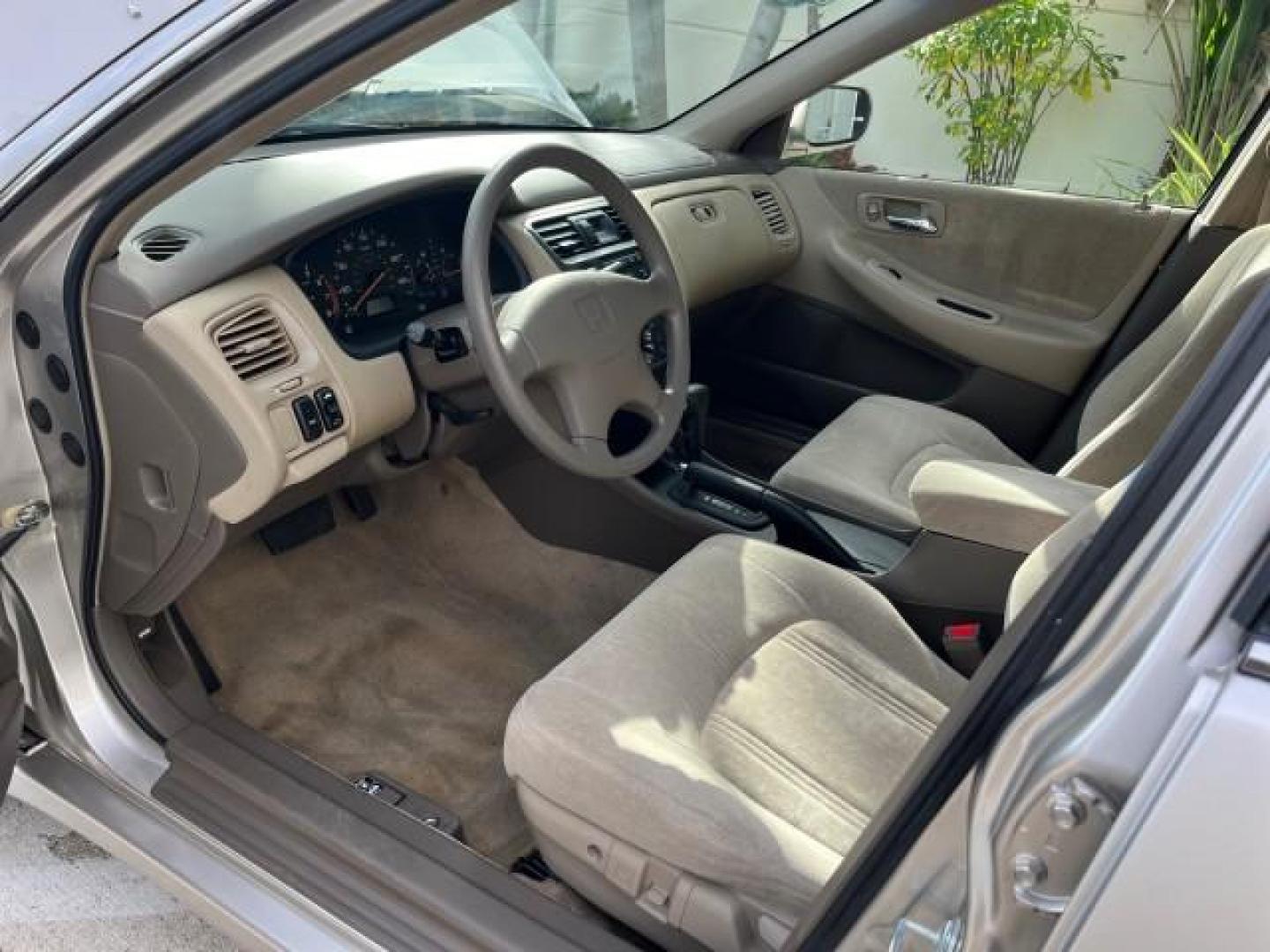 1999 Satin Silver (Met) /Ivory Honda Accord Sdn 1 FL EX LOW MILES 61,390 (JHMCG6679XC) with an 2.3L VTEC I4 ULEV-Certified Engine engine, Automatic transmission, located at 4701 North Dixie Hwy, Pompano Beach, FL, 33064, (954) 422-2889, 26.240938, -80.123474 - OUR WEBPAGE FLORIDACARS1.COM HAS OVER 100 PHOTOS AND FREE CARFAX LINK 1999 HONDA ACCORD EX ROAD READY 2.3L I4 VIN: JHMCG6679XC028564 NO RECALLS 30 MPG SEDAN 4 DR 1 OWNER FLORIDA 2.3L I4 F OHV VERY LOW MILES 61,390 GASOLINE POWER SUNROOF/MIRRORS FRONT WHEEL DRIVE 20 SERVICE RECORDS ABS Brakes Automat - Photo#47