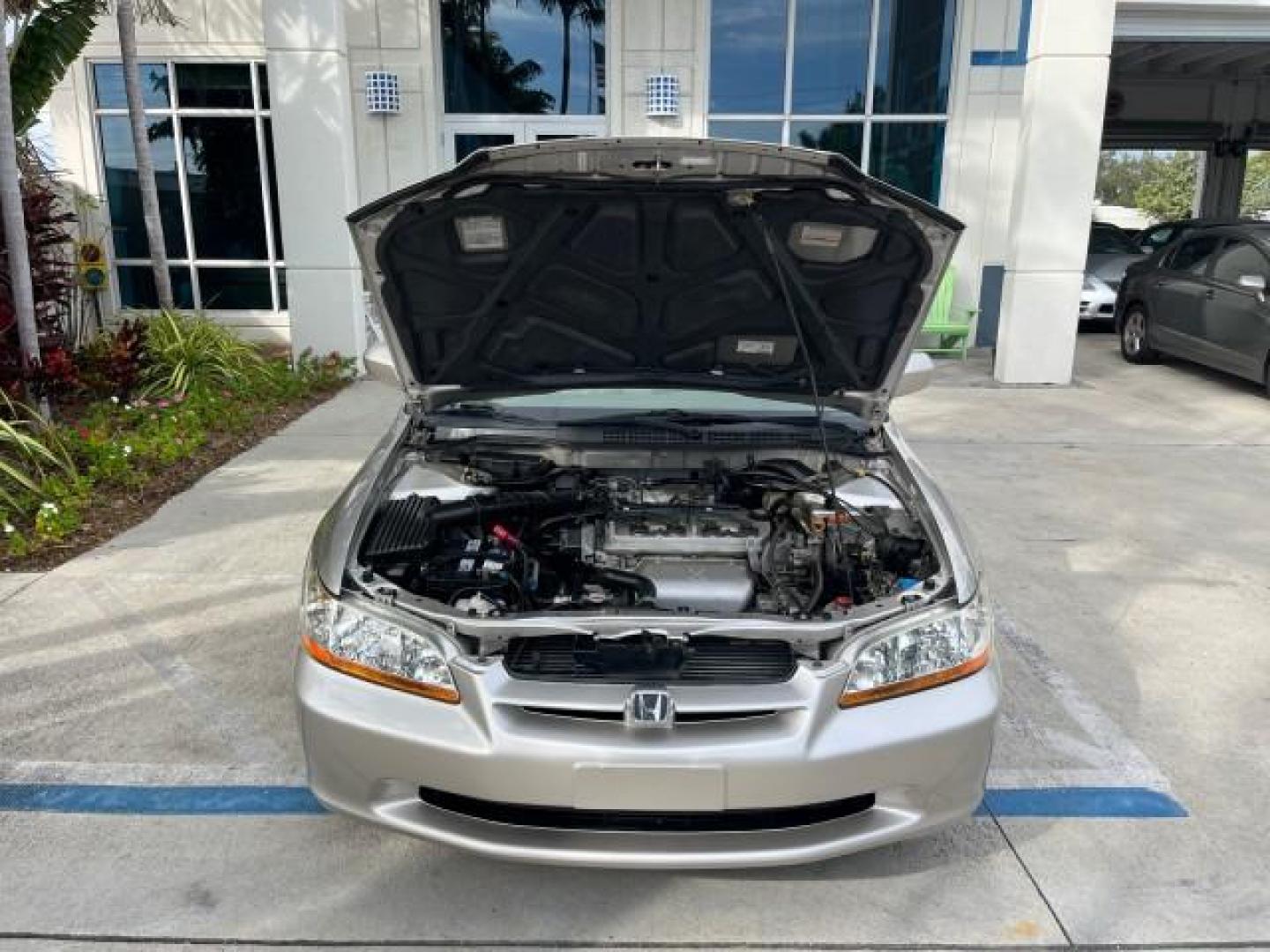 1999 Satin Silver (Met) /Ivory Honda Accord Sdn 1 FL EX LOW MILES 61,390 (JHMCG6679XC) with an 2.3L VTEC I4 ULEV-Certified Engine engine, Automatic transmission, located at 4701 North Dixie Hwy, Pompano Beach, FL, 33064, (954) 422-2889, 26.240938, -80.123474 - OUR WEBPAGE FLORIDACARS1.COM HAS OVER 100 PHOTOS AND FREE CARFAX LINK 1999 HONDA ACCORD EX ROAD READY 2.3L I4 VIN: JHMCG6679XC028564 NO RECALLS 30 MPG SEDAN 4 DR 1 OWNER FLORIDA 2.3L I4 F OHV VERY LOW MILES 61,390 GASOLINE POWER SUNROOF/MIRRORS FRONT WHEEL DRIVE 20 SERVICE RECORDS ABS Brakes Automat - Photo#71