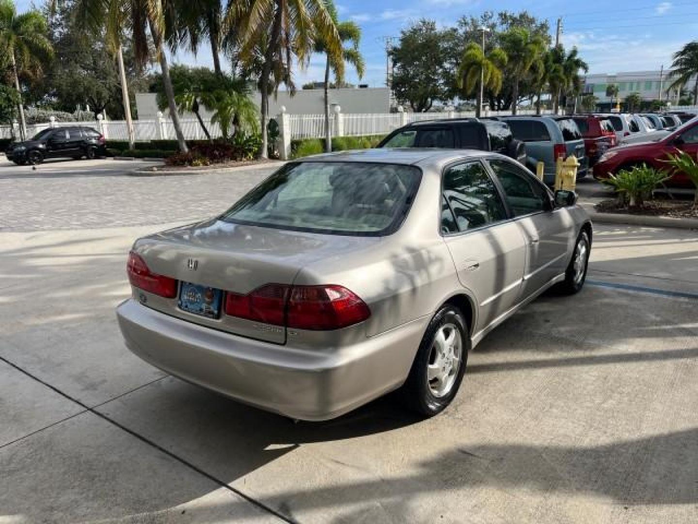 1999 Satin Silver (Met) /Ivory Honda Accord Sdn 1 FL EX LOW MILES 61,390 (JHMCG6679XC) with an 2.3L VTEC I4 ULEV-Certified Engine engine, Automatic transmission, located at 4701 North Dixie Hwy, Pompano Beach, FL, 33064, (954) 422-2889, 26.240938, -80.123474 - OUR WEBPAGE FLORIDACARS1.COM HAS OVER 100 PHOTOS AND FREE CARFAX LINK 1999 HONDA ACCORD EX ROAD READY 2.3L I4 VIN: JHMCG6679XC028564 NO RECALLS 30 MPG SEDAN 4 DR 1 OWNER FLORIDA 2.3L I4 F OHV VERY LOW MILES 61,390 GASOLINE POWER SUNROOF/MIRRORS FRONT WHEEL DRIVE 20 SERVICE RECORDS ABS Brakes Automat - Photo#7