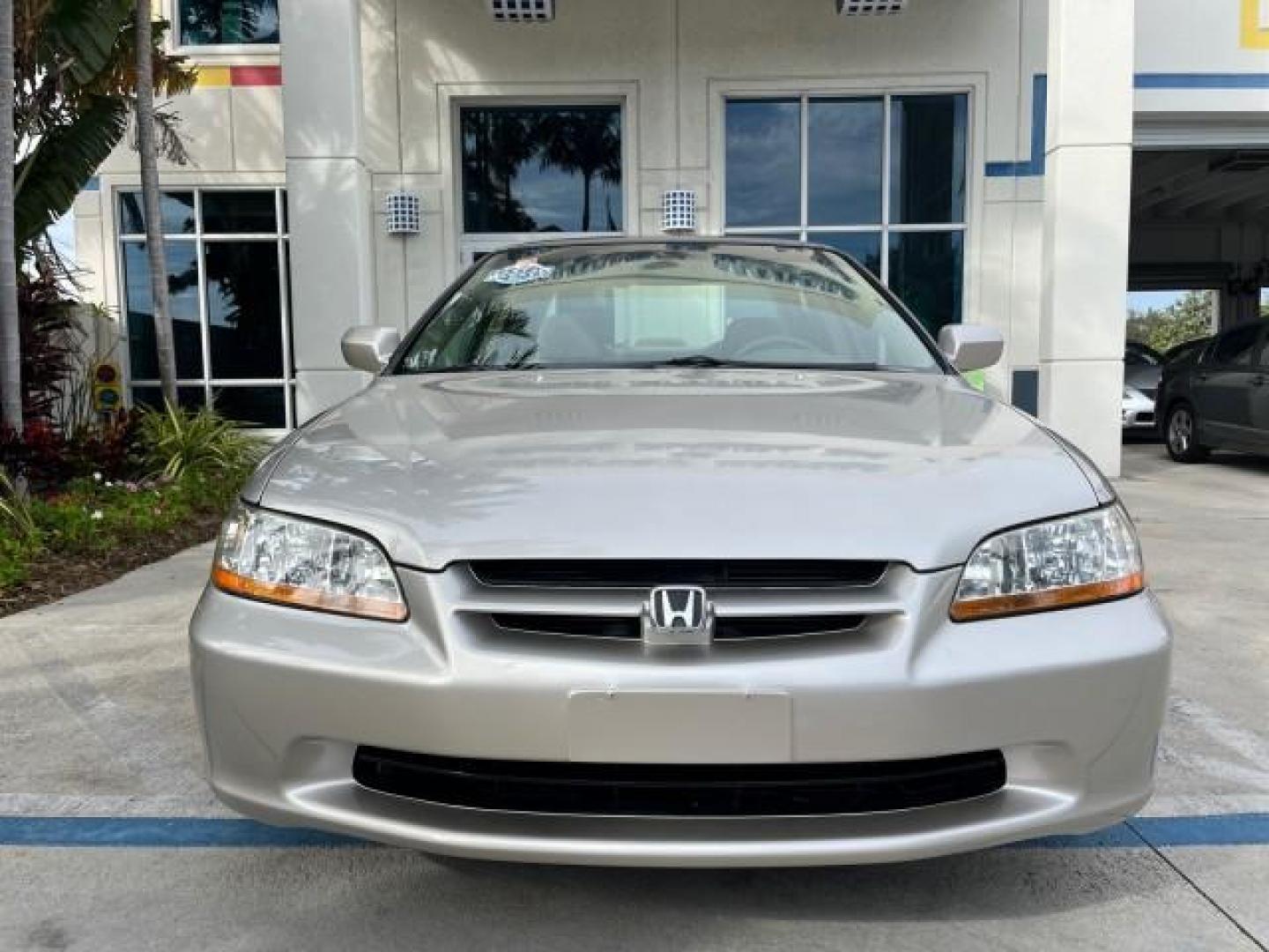 1999 Satin Silver (Met) /Ivory Honda Accord Sdn 1 FL EX LOW MILES 61,390 (JHMCG6679XC) with an 2.3L VTEC I4 ULEV-Certified Engine engine, Automatic transmission, located at 4701 North Dixie Hwy, Pompano Beach, FL, 33064, (954) 422-2889, 26.240938, -80.123474 - OUR WEBPAGE FLORIDACARS1.COM HAS OVER 100 PHOTOS AND FREE CARFAX LINK 1999 HONDA ACCORD EX ROAD READY 2.3L I4 VIN: JHMCG6679XC028564 NO RECALLS 30 MPG SEDAN 4 DR 1 OWNER FLORIDA 2.3L I4 F OHV VERY LOW MILES 61,390 GASOLINE POWER SUNROOF/MIRRORS FRONT WHEEL DRIVE 20 SERVICE RECORDS ABS Brakes Automat - Photo#80