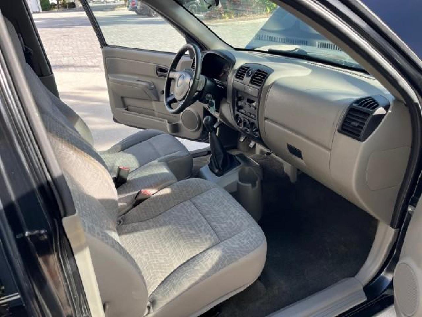 2006 Black /Light Cashmere Chevrolet Colorado 1 FL LS LOW MILES 53,797 (1GCCS148368) with an 2.8L DOHC 4-Cyl MFI Engine engine, Manual transmission, located at 4701 North Dixie Hwy, Pompano Beach, FL, 33064, (954) 422-2889, 26.240938, -80.123474 - OUR WEBPAGE FLORIDACARS1.COM HAS OVER 100 PHOTOS AND FREE CARFAX LINK 2006 CHEVROLET COLORADO WORK TRUCK ROAD READY WORK READY VIN: 1GCCS148368250775 NO ACCIDENTS 2.8L I4 PICKUP 1 OWNER FLORIDA 2.8L I4 F LOW MILES 53,797 25 MPG GASOLINE 6.1 FT BED LENGHT REAR WHEEL DRIVE MANUAL 5 SERVICE RECORDS 6.1 - Photo#13