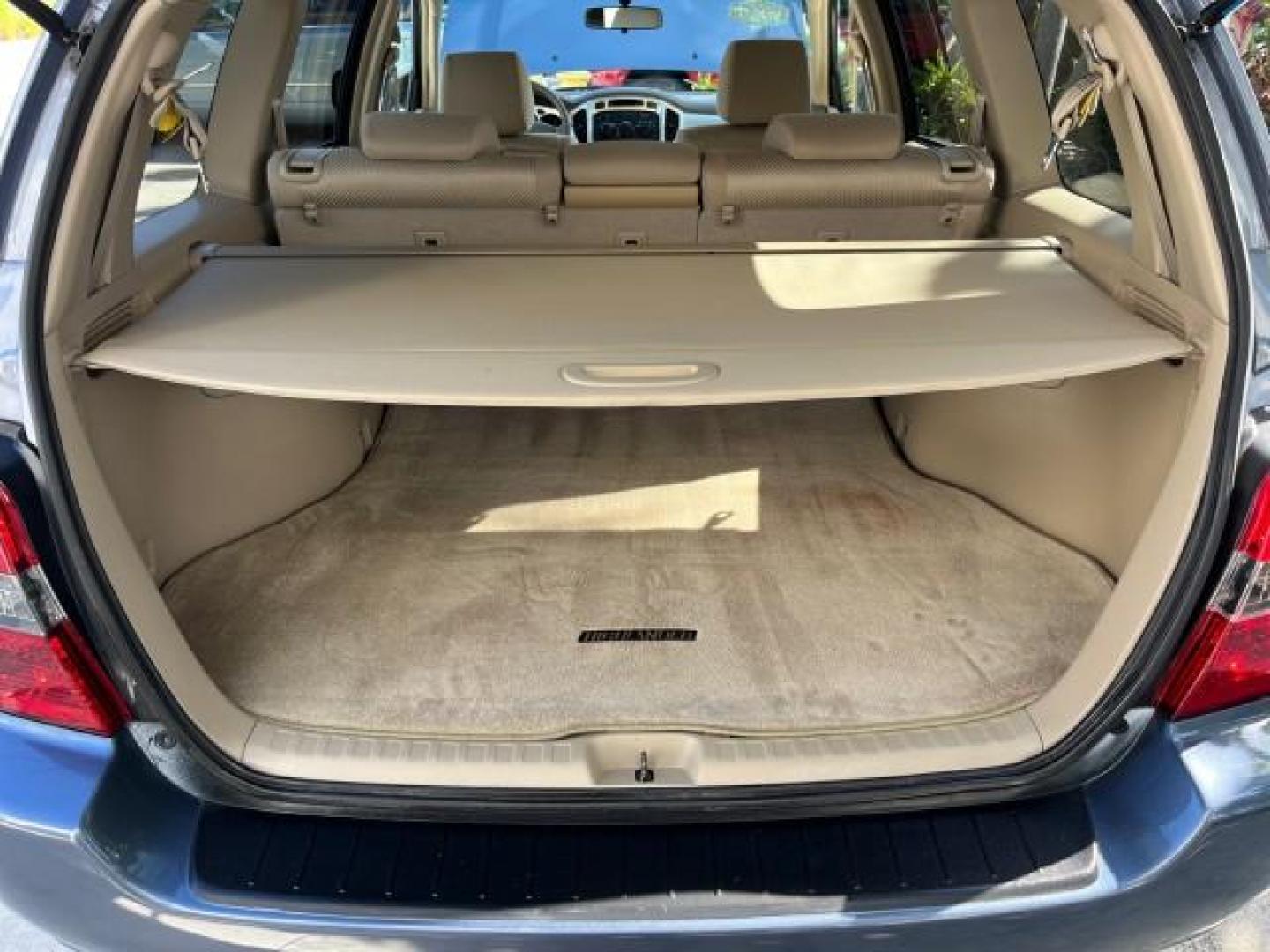 2005 Bluestone Metallic /Ivory Toyota Highlander FL LOW MILES 39,779 (JTEDP21A150) with an 3.3L DOHC SFI 24-Valve VVT-i V6 Engine engine, Automatic transmission, located at 4701 North Dixie Hwy, Pompano Beach, FL, 33064, (954) 422-2889, 26.240938, -80.123474 - OUR WEBPAGE FLORIDACARS1.COM HAS OVER 100 PHOTOS AND FREE CARFAX LINK 2005 TOYOTA HIGHLANDER ROAD READY 3.3L V6 VIN: JTEDP21A150075101 NO ACCIDENTS 25 MPG 4 DOOR WAGON/SPORT UTILITY NO RECALLS SUNROOF 3.3L V6 F DOHC 24V FLORIDA OWNER GASOLINE LOW MILES 39,779 FRONT WHEEL DRIVE 6 SERVICE RECORDS Auto - Photo#72