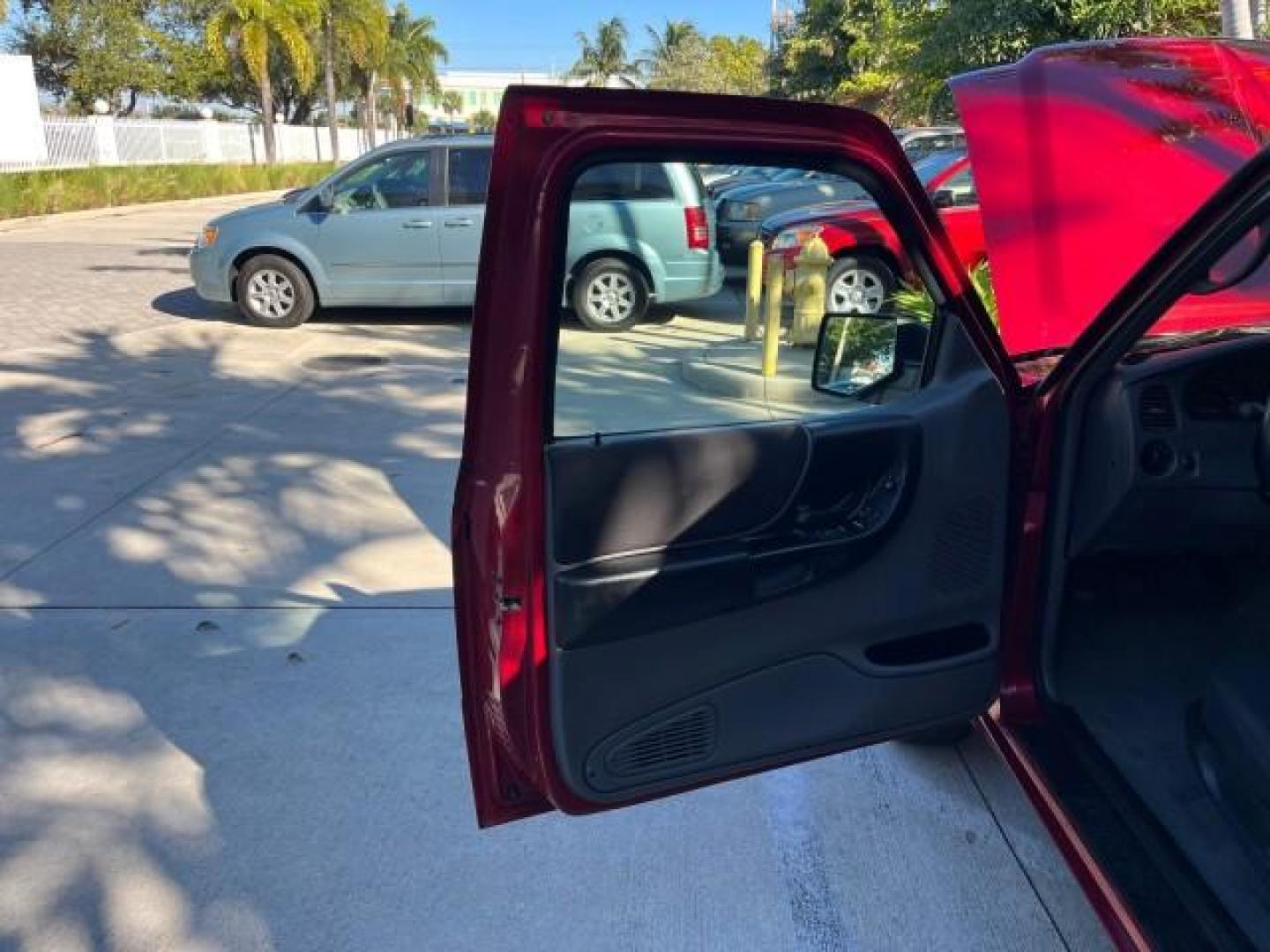 2007 Redfire /Medium Dk Flint Ford Ranger FL XLT LOW MILES 71,438 5SPD (1FTYR14D47P) with an 2.3L DOHC 16-Valve I4 Engine engine, Manual transmission, located at 4701 North Dixie Hwy, Pompano Beach, FL, 33064, (954) 422-2889, 26.240938, -80.123474 - OUR WEBPAGE FLORIDACARS1.COM HAS OVER 100 PHOTOS AND FREE CARFAX LINK 2007 FORD RANGER XL ROAD READY WORK READY VIN: 1FTYR14D47PA12424 NO ACCIDENTS 2.3L I4 CLUB CAB PICKUP FLORIDA OWNER 29 MPG 2.3L 4 F 5 SPD 4 CYL HARD TO FIND LOW MILES 71,438 XLT GASOLINE 6.0 FT BED LENGTH REAR WHEEL DRIVE MANUAL 1 - Photo#9