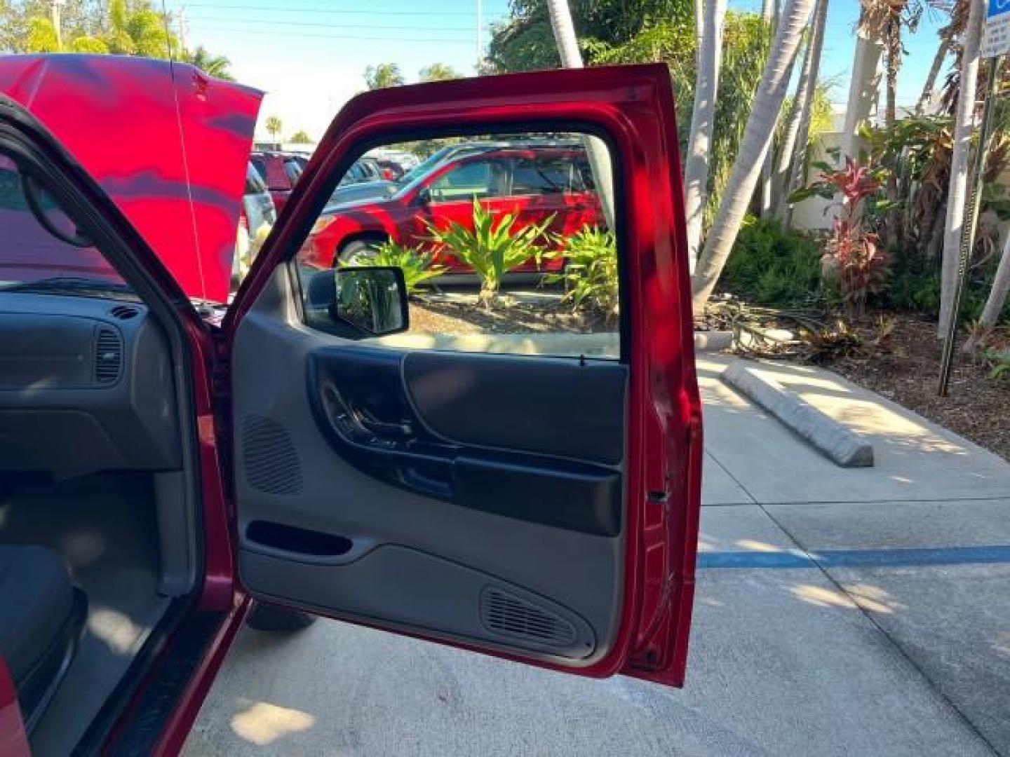 2007 Redfire /Medium Dk Flint Ford Ranger FL XLT LOW MILES 71,438 5SPD (1FTYR14D47P) with an 2.3L DOHC 16-Valve I4 Engine engine, Manual transmission, located at 4701 North Dixie Hwy, Pompano Beach, FL, 33064, (954) 422-2889, 26.240938, -80.123474 - OUR WEBPAGE FLORIDACARS1.COM HAS OVER 100 PHOTOS AND FREE CARFAX LINK 2007 FORD RANGER XL ROAD READY WORK READY VIN: 1FTYR14D47PA12424 NO ACCIDENTS 2.3L I4 CLUB CAB PICKUP FLORIDA OWNER 29 MPG 2.3L 4 F 5 SPD 4 CYL HARD TO FIND LOW MILES 71,438 XLT GASOLINE 6.0 FT BED LENGTH REAR WHEEL DRIVE MANUAL 1 - Photo#11