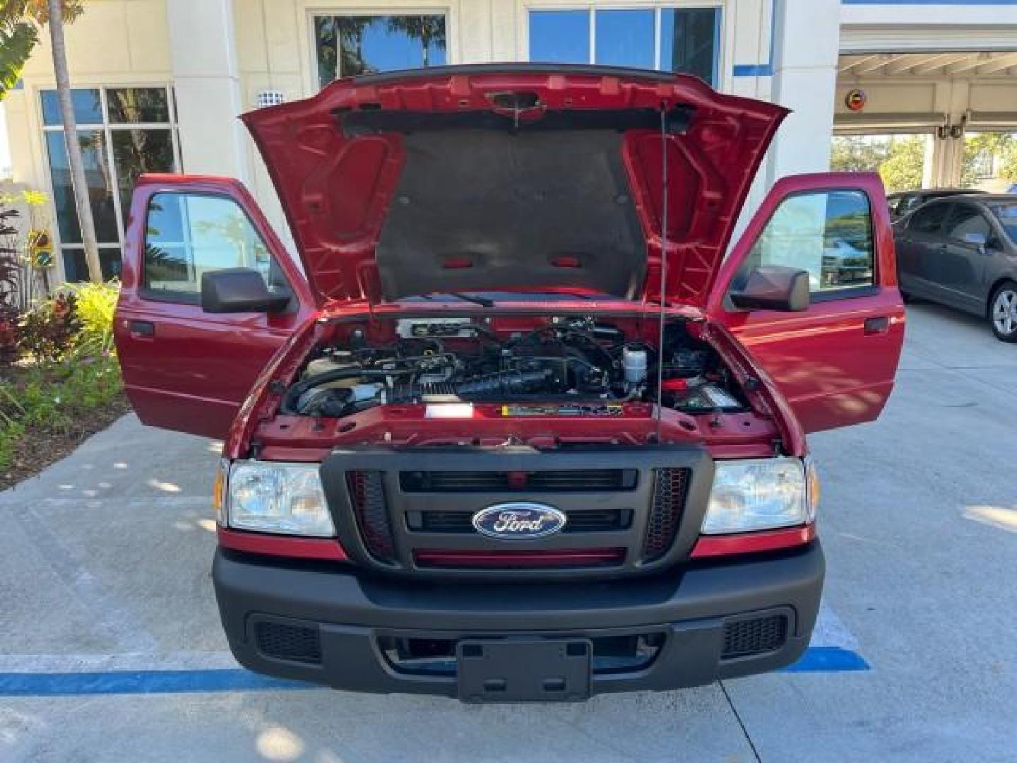 2007 Redfire /Medium Dk Flint Ford Ranger FL XLT LOW MILES 71,438 5SPD (1FTYR14D47P) with an 2.3L DOHC 16-Valve I4 Engine engine, Manual transmission, located at 4701 North Dixie Hwy, Pompano Beach, FL, 33064, (954) 422-2889, 26.240938, -80.123474 - OUR WEBPAGE FLORIDACARS1.COM HAS OVER 100 PHOTOS AND FREE CARFAX LINK 2007 FORD RANGER XL ROAD READY WORK READY VIN: 1FTYR14D47PA12424 NO ACCIDENTS 2.3L I4 CLUB CAB PICKUP FLORIDA OWNER 29 MPG 2.3L 4 F 5 SPD 4 CYL HARD TO FIND LOW MILES 71,438 XLT GASOLINE 6.0 FT BED LENGTH REAR WHEEL DRIVE MANUAL 1 - Photo#16