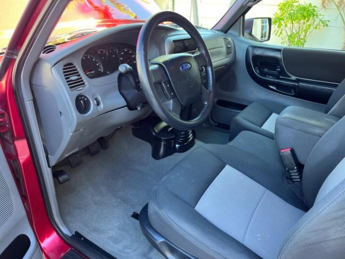 2007 Redfire /Medium Dk Flint Ford Ranger FL XLT LOW MILES 71,438 5SPD (1FTYR14D47P) with an 2.3L DOHC 16-Valve I4 Engine engine, Manual transmission, located at 4701 North Dixie Hwy, Pompano Beach, FL, 33064, (954) 422-2889, 26.240938, -80.123474 - OUR WEBPAGE FLORIDACARS1.COM HAS OVER 100 PHOTOS AND FREE CARFAX LINK 2007 FORD RANGER XL ROAD READY WORK READY VIN: 1FTYR14D47PA12424 NO ACCIDENTS 2.3L I4 CLUB CAB PICKUP FLORIDA OWNER 29 MPG 2.3L 4 F 5 SPD 4 CYL HARD TO FIND LOW MILES 71,438 XLT GASOLINE 6.0 FT BED LENGTH REAR WHEEL DRIVE MANUAL 1 - Photo#34