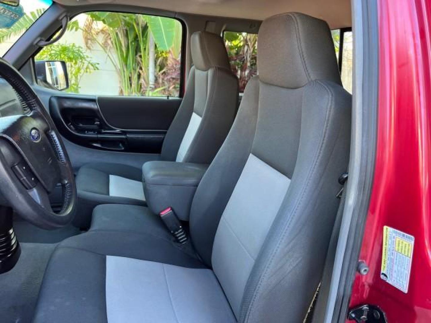 2007 Redfire /Medium Dk Flint Ford Ranger FL XLT LOW MILES 71,438 5SPD (1FTYR14D47P) with an 2.3L DOHC 16-Valve I4 Engine engine, Manual transmission, located at 4701 North Dixie Hwy, Pompano Beach, FL, 33064, (954) 422-2889, 26.240938, -80.123474 - OUR WEBPAGE FLORIDACARS1.COM HAS OVER 100 PHOTOS AND FREE CARFAX LINK 2007 FORD RANGER XL ROAD READY WORK READY VIN: 1FTYR14D47PA12424 NO ACCIDENTS 2.3L I4 CLUB CAB PICKUP FLORIDA OWNER 29 MPG 2.3L 4 F 5 SPD 4 CYL HARD TO FIND LOW MILES 71,438 XLT GASOLINE 6.0 FT BED LENGTH REAR WHEEL DRIVE MANUAL 1 - Photo#35