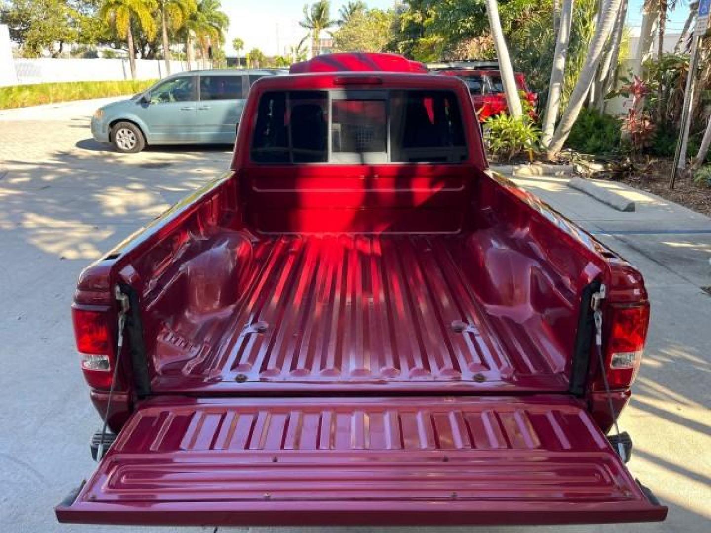 2007 Redfire /Medium Dk Flint Ford Ranger FL XLT LOW MILES 71,438 5SPD (1FTYR14D47P) with an 2.3L DOHC 16-Valve I4 Engine engine, Manual transmission, located at 4701 North Dixie Hwy, Pompano Beach, FL, 33064, (954) 422-2889, 26.240938, -80.123474 - OUR WEBPAGE FLORIDACARS1.COM HAS OVER 100 PHOTOS AND FREE CARFAX LINK 2007 FORD RANGER XL ROAD READY WORK READY VIN: 1FTYR14D47PA12424 NO ACCIDENTS 2.3L I4 CLUB CAB PICKUP FLORIDA OWNER 29 MPG 2.3L 4 F 5 SPD 4 CYL HARD TO FIND LOW MILES 71,438 XLT GASOLINE 6.0 FT BED LENGTH REAR WHEEL DRIVE MANUAL 1 - Photo#60