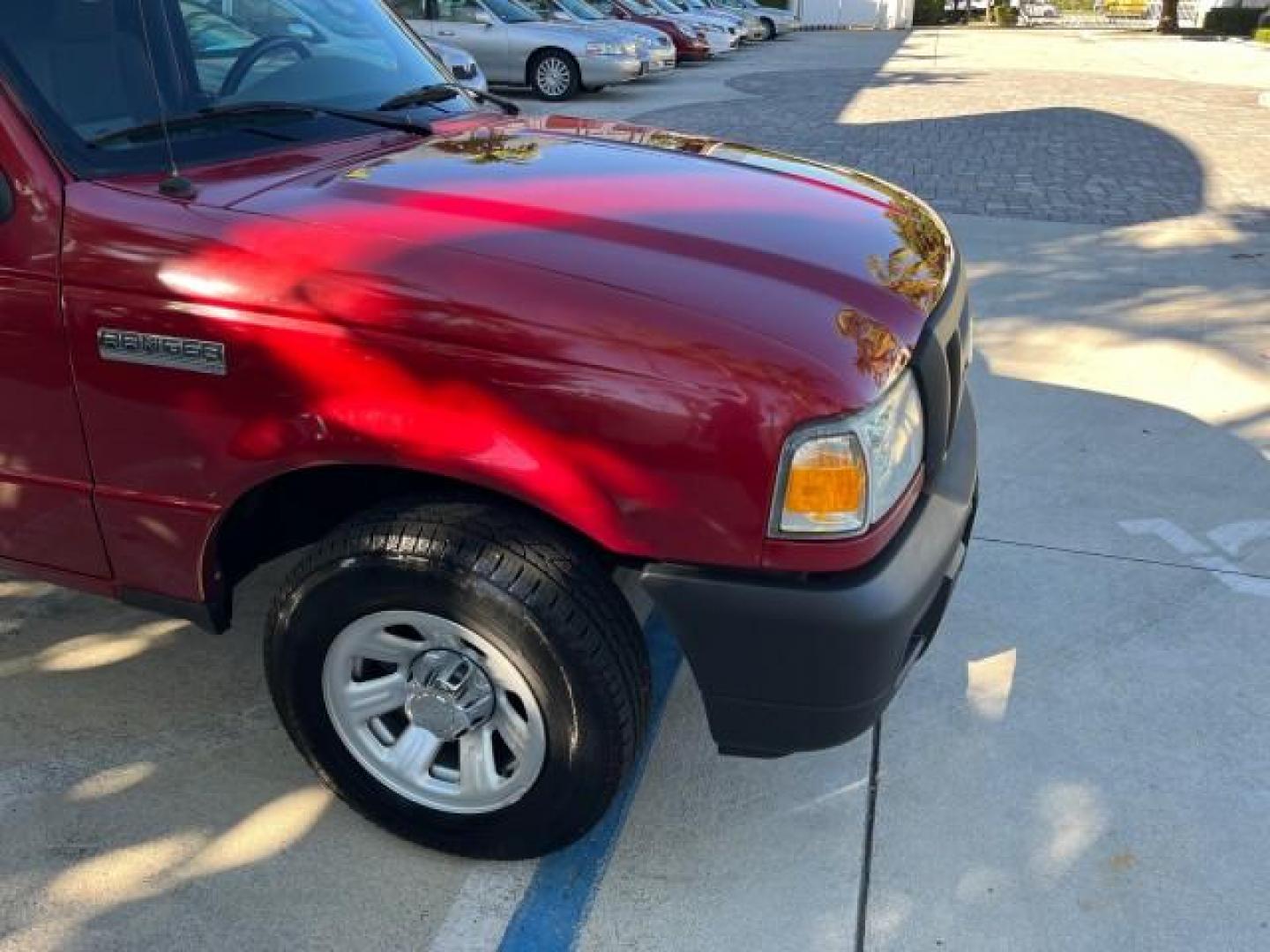 2007 Redfire /Medium Dk Flint Ford Ranger FL XLT LOW MILES 71,438 5SPD (1FTYR14D47P) with an 2.3L DOHC 16-Valve I4 Engine engine, Manual transmission, located at 4701 North Dixie Hwy, Pompano Beach, FL, 33064, (954) 422-2889, 26.240938, -80.123474 - OUR WEBPAGE FLORIDACARS1.COM HAS OVER 100 PHOTOS AND FREE CARFAX LINK 2007 FORD RANGER XL ROAD READY WORK READY VIN: 1FTYR14D47PA12424 NO ACCIDENTS 2.3L I4 CLUB CAB PICKUP FLORIDA OWNER 29 MPG 2.3L 4 F 5 SPD 4 CYL HARD TO FIND LOW MILES 71,438 XLT GASOLINE 6.0 FT BED LENGTH REAR WHEEL DRIVE MANUAL 1 - Photo#83