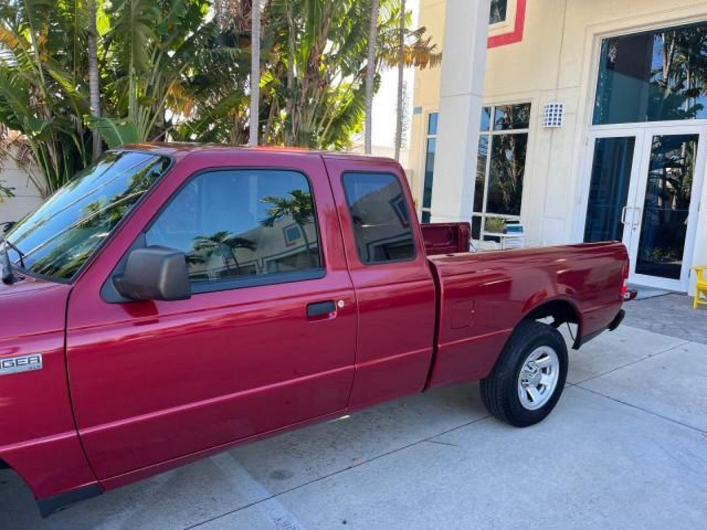 2007 Redfire /Medium Dk Flint Ford Ranger FL XLT LOW MILES 71,438 5SPD (1FTYR14D47P) with an 2.3L DOHC 16-Valve I4 Engine engine, Manual transmission, located at 4701 North Dixie Hwy, Pompano Beach, FL, 33064, (954) 422-2889, 26.240938, -80.123474 - OUR WEBPAGE FLORIDACARS1.COM HAS OVER 100 PHOTOS AND FREE CARFAX LINK 2007 FORD RANGER XL ROAD READY WORK READY VIN: 1FTYR14D47PA12424 NO ACCIDENTS 2.3L I4 CLUB CAB PICKUP FLORIDA OWNER 29 MPG 2.3L 4 F 5 SPD 4 CYL HARD TO FIND LOW MILES 71,438 XLT GASOLINE 6.0 FT BED LENGTH REAR WHEEL DRIVE MANUAL 1 - Photo#85