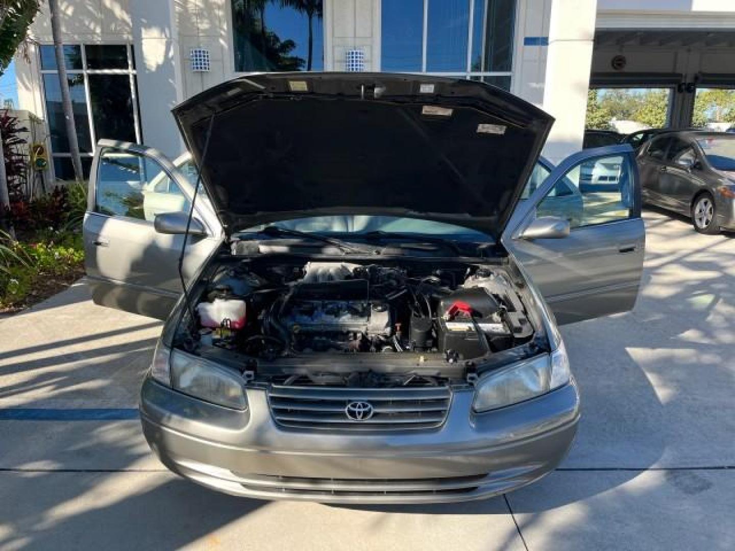 1998 Classic Green Pearl /Gray Toyota Camry FL LE LOW MILES 48,539 (JT2BF22K4W0) with an 3.0L Twin-Cam EFI 24-Valve V6 Engine engine, Automatic transmission, located at 4701 North Dixie Hwy, Pompano Beach, FL, 33064, (954) 422-2889, 26.240938, -80.123474 - OUR WEBPAGE FLORIDACARS1.COM HAS OVER 100 PHOTOS AND FREE CARFAX LINK 1998 TOYOTA CAMRY CE V6 ROAD READY 3.0L V6 VIN: JT2BF22K4W0134660 FLORIDA OWNER SEDAN 4 DR LOW MILES 48,539 3.0L V6 F DOHC 24V NO RECALLS 28 MPG GASOLINE POWER MIRRORS FRONT WHEEL DRIVE ABS Brakes Automatic Transmission Cruise Con - Photo#16