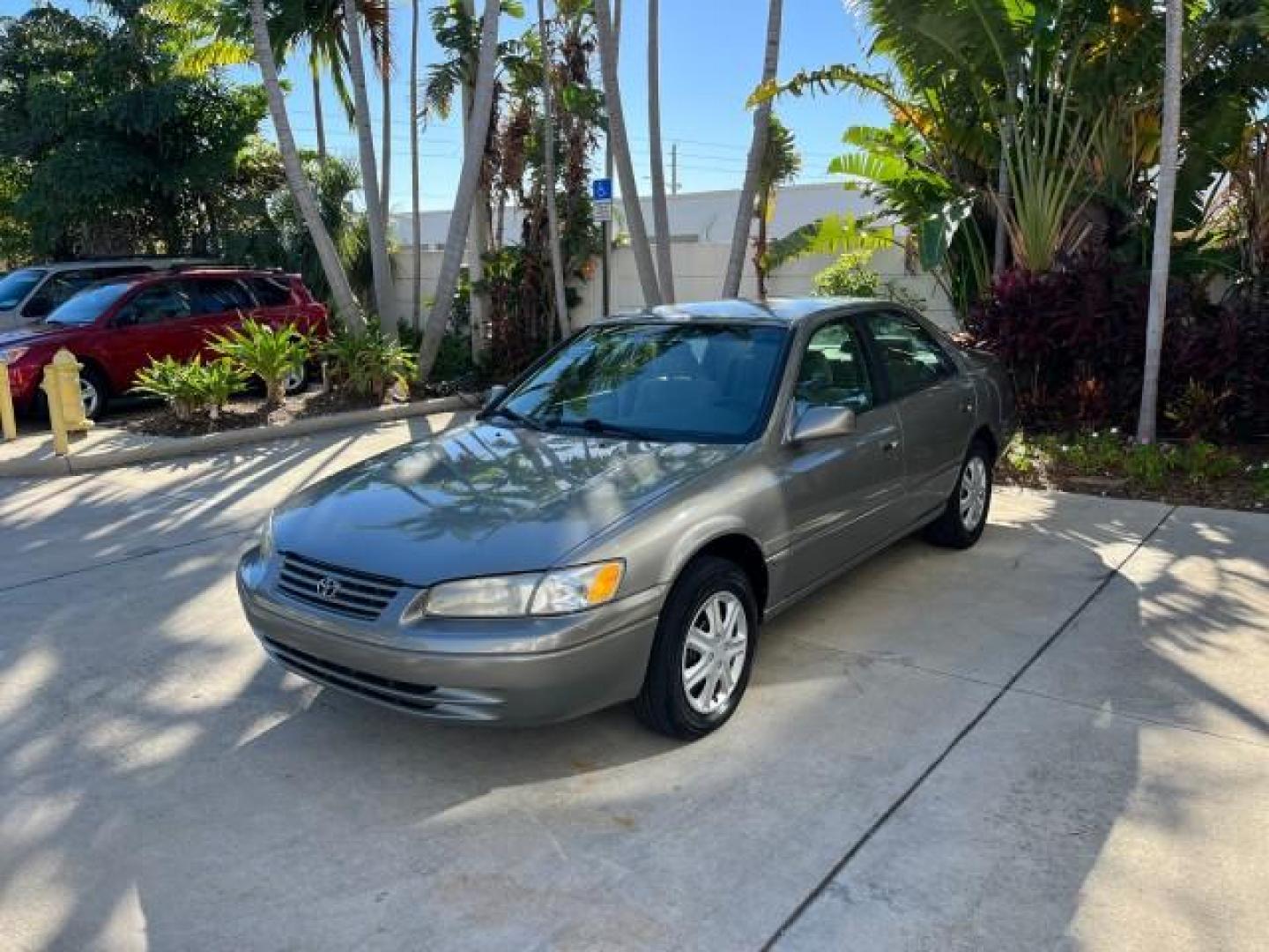 1998 Classic Green Pearl /Gray Toyota Camry FL LE LOW MILES 48,539 (JT2BF22K4W0) with an 3.0L Twin-Cam EFI 24-Valve V6 Engine engine, Automatic transmission, located at 4701 North Dixie Hwy, Pompano Beach, FL, 33064, (954) 422-2889, 26.240938, -80.123474 - OUR WEBPAGE FLORIDACARS1.COM HAS OVER 100 PHOTOS AND FREE CARFAX LINK 1998 TOYOTA CAMRY CE V6 ROAD READY 3.0L V6 VIN: JT2BF22K4W0134660 FLORIDA OWNER SEDAN 4 DR LOW MILES 48,539 3.0L V6 F DOHC 24V NO RECALLS 28 MPG GASOLINE POWER MIRRORS FRONT WHEEL DRIVE ABS Brakes Automatic Transmission Cruise Con - Photo#3