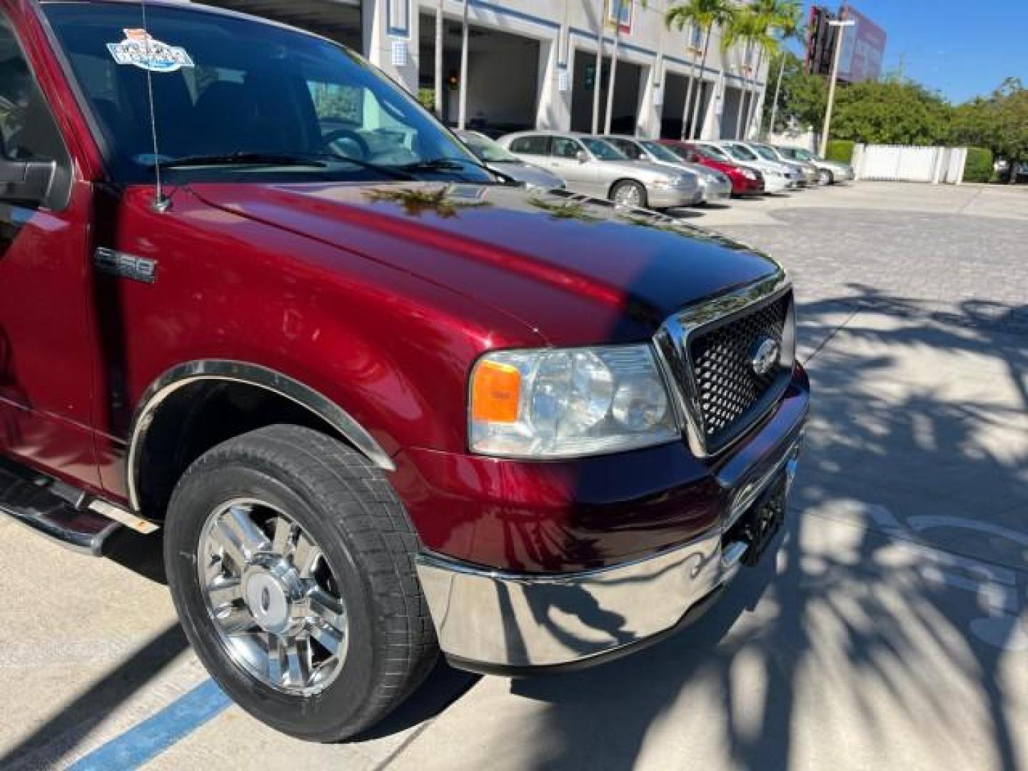 2006 Dark Toreador Red Metallic /Flint Ford F-150 1 owner XLT LOW MILES 69,808 (1FTPW02506K) with an 5.4L 3v EFI V8 Engine engine, Automatic transmission, located at 4701 North Dixie Hwy, Pompano Beach, FL, 33064, (954) 422-2889, 26.240938, -80.123474 - OUR WEBPAGE FLORIDACARS1.COM HAS OVER 100 PHOTOS AND FREE CARFAX LINK 2006 FORD F-150 XLT ROAD READY WORK READY VIN: 1FTPW02506KC69439 NO RECALLS 5.4L V8 CREW PICKUP 1 OWNER 6.6 FT BED 5.4L V8 F SOHC 9 SERVICE RECORDS GASOLINE POWER SEATS REAR WHEEL DRIVE POWER MIRRORS 6.6' Bed Length Anti-Theft Sys - Photo#94