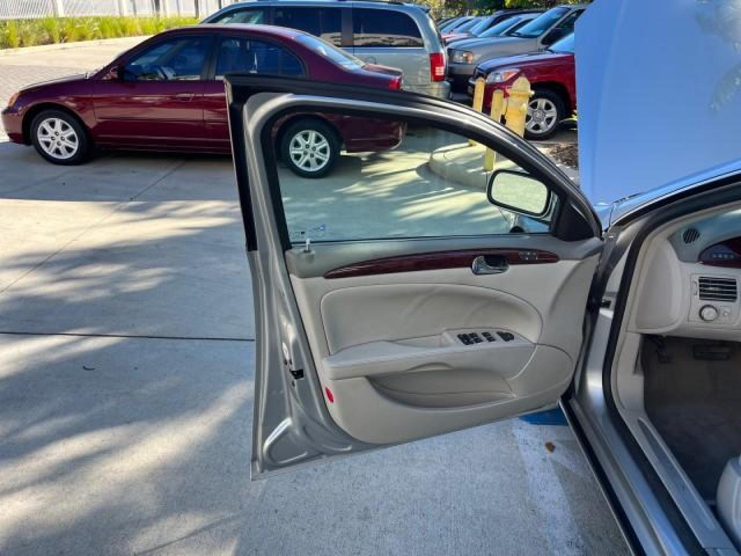 2007 Platinum Metallic /Cocoa/Shale Buick Lucerne V6 CXL LOW MILES 36,082 (1G4HD57247U) with an 3.8L V6 SFI Engine engine, Automatic transmission, located at 4701 North Dixie Hwy, Pompano Beach, FL, 33064, (954) 422-2889, 26.240938, -80.123474 - OUR WEBPAGE FLORIDACARS1.COM HAS OVER 100 PHOTOS AND FREE CARFAX LINK 2007 BUICK LUCERNE CXL V6 ROAD READY 3.8L V6 CXL VIN: 1G4HD57247U216623 NO RECALLS 26 MPG SEDAN 4 DR SUPER LOW MILES 36,082 3.8L V6 F 3800 THE BEST POWER LEATHER SEATS GASOLINE 7 SERVICE RECORDS FRONT WHEEL DRIVE POWER MIRRORS Ada - Photo#9