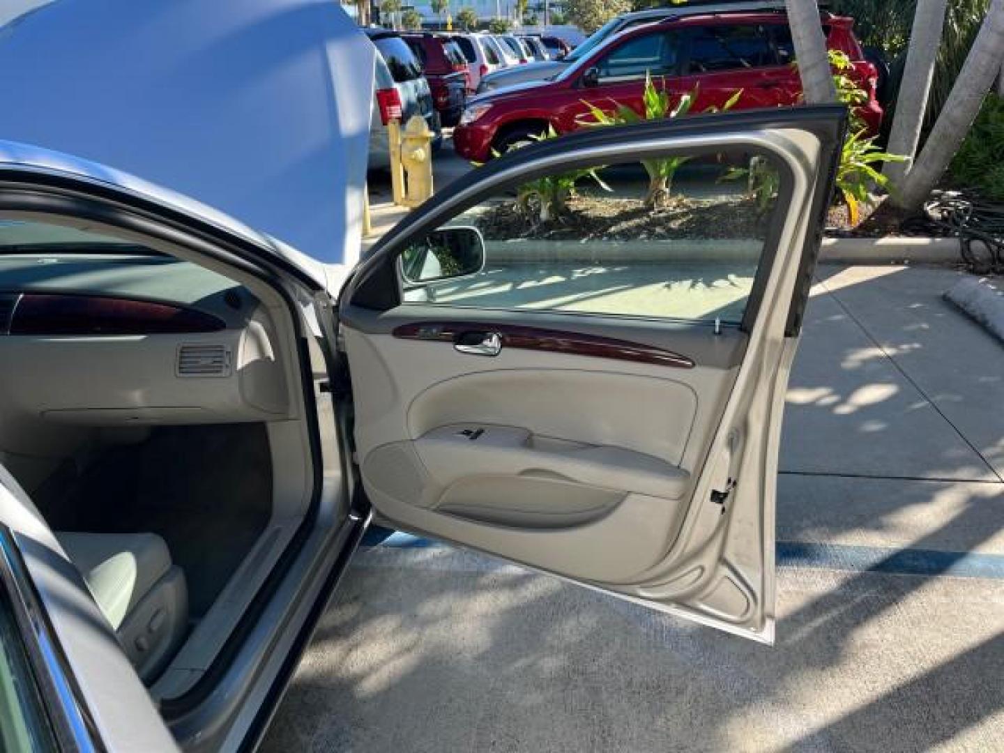 2007 Platinum Metallic /Cocoa/Shale Buick Lucerne V6 CXL LOW MILES 36,082 (1G4HD57247U) with an 3.8L V6 SFI Engine engine, Automatic transmission, located at 4701 North Dixie Hwy, Pompano Beach, FL, 33064, (954) 422-2889, 26.240938, -80.123474 - OUR WEBPAGE FLORIDACARS1.COM HAS OVER 100 PHOTOS AND FREE CARFAX LINK 2007 BUICK LUCERNE CXL V6 ROAD READY 3.8L V6 CXL VIN: 1G4HD57247U216623 NO RECALLS 26 MPG SEDAN 4 DR SUPER LOW MILES 36,082 3.8L V6 F 3800 THE BEST POWER LEATHER SEATS GASOLINE 7 SERVICE RECORDS FRONT WHEEL DRIVE POWER MIRRORS Ada - Photo#11