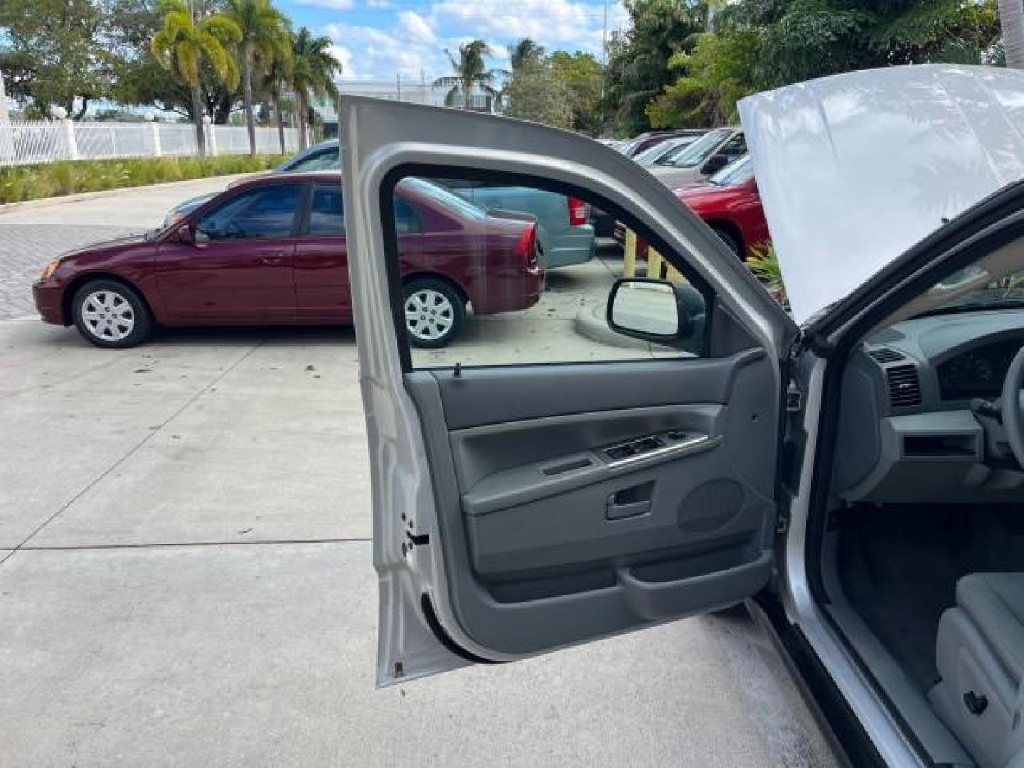 2006 Bright Silver Metallic /Medium Slate Gray Jeep Grand Cherokee 1 FL Laredo LOW MILES 57,272 (1J4GS48K06C) with an 3.7L V6 Engine engine, Automatic transmission, located at 4701 North Dixie Hwy, Pompano Beach, FL, 33064, (954) 422-2889, 26.240938, -80.123474 - OUR WEBPAGE FLORIDACARS1.COM HAS OVER 100 PHOTOS AND FREE CARFAX LINK 2006 JEEP GRAND CHEROKEE LAREDO ROAD READY 3.7L V6 VIN: 1J4GS48K06C160709 NO ACCIDENTS 4 DOOR WAGON/SPORT UTILITY NO RECALLS 3.7L V6 F 1 OWNER FLORIDA GASOLINE LOW MILES 57,272 REAR WHEEL DRIVE POWER SEATS/MIRRORS Active Head Rest - Photo#10