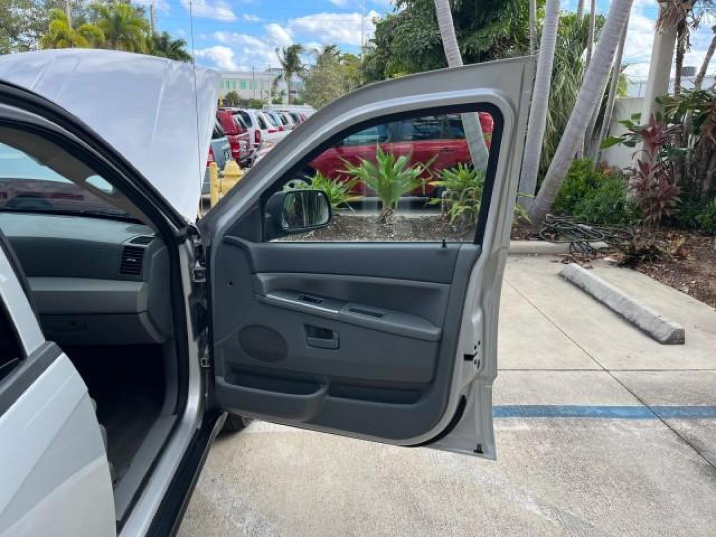 2006 Bright Silver Metallic /Medium Slate Gray Jeep Grand Cherokee 1 FL Laredo LOW MILES 57,272 (1J4GS48K06C) with an 3.7L V6 Engine engine, Automatic transmission, located at 4701 North Dixie Hwy, Pompano Beach, FL, 33064, (954) 422-2889, 26.240938, -80.123474 - OUR WEBPAGE FLORIDACARS1.COM HAS OVER 100 PHOTOS AND FREE CARFAX LINK 2006 JEEP GRAND CHEROKEE LAREDO ROAD READY 3.7L V6 VIN: 1J4GS48K06C160709 NO ACCIDENTS 4 DOOR WAGON/SPORT UTILITY NO RECALLS 3.7L V6 F 1 OWNER FLORIDA GASOLINE LOW MILES 57,272 REAR WHEEL DRIVE POWER SEATS/MIRRORS Active Head Rest - Photo#12