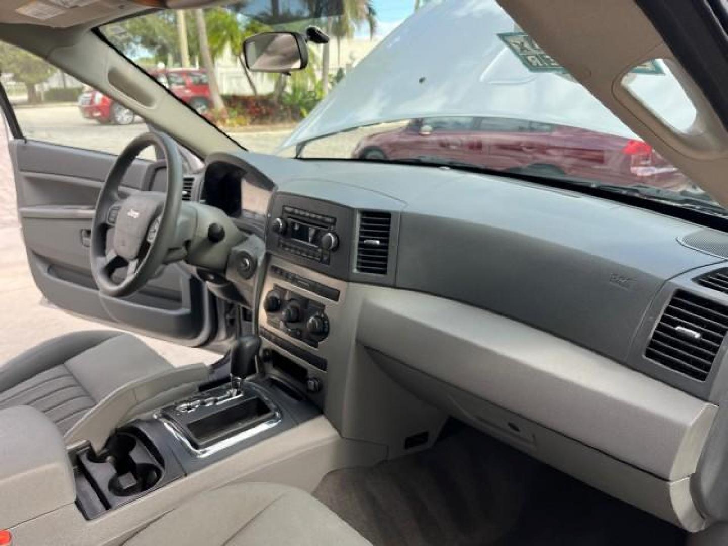 2006 Bright Silver Metallic /Medium Slate Gray Jeep Grand Cherokee 1 FL Laredo LOW MILES 57,272 (1J4GS48K06C) with an 3.7L V6 Engine engine, Automatic transmission, located at 4701 North Dixie Hwy, Pompano Beach, FL, 33064, (954) 422-2889, 26.240938, -80.123474 - OUR WEBPAGE FLORIDACARS1.COM HAS OVER 100 PHOTOS AND FREE CARFAX LINK 2006 JEEP GRAND CHEROKEE LAREDO ROAD READY 3.7L V6 VIN: 1J4GS48K06C160709 NO ACCIDENTS 4 DOOR WAGON/SPORT UTILITY NO RECALLS 3.7L V6 F 1 OWNER FLORIDA GASOLINE LOW MILES 57,272 REAR WHEEL DRIVE POWER SEATS/MIRRORS Active Head Rest - Photo#27