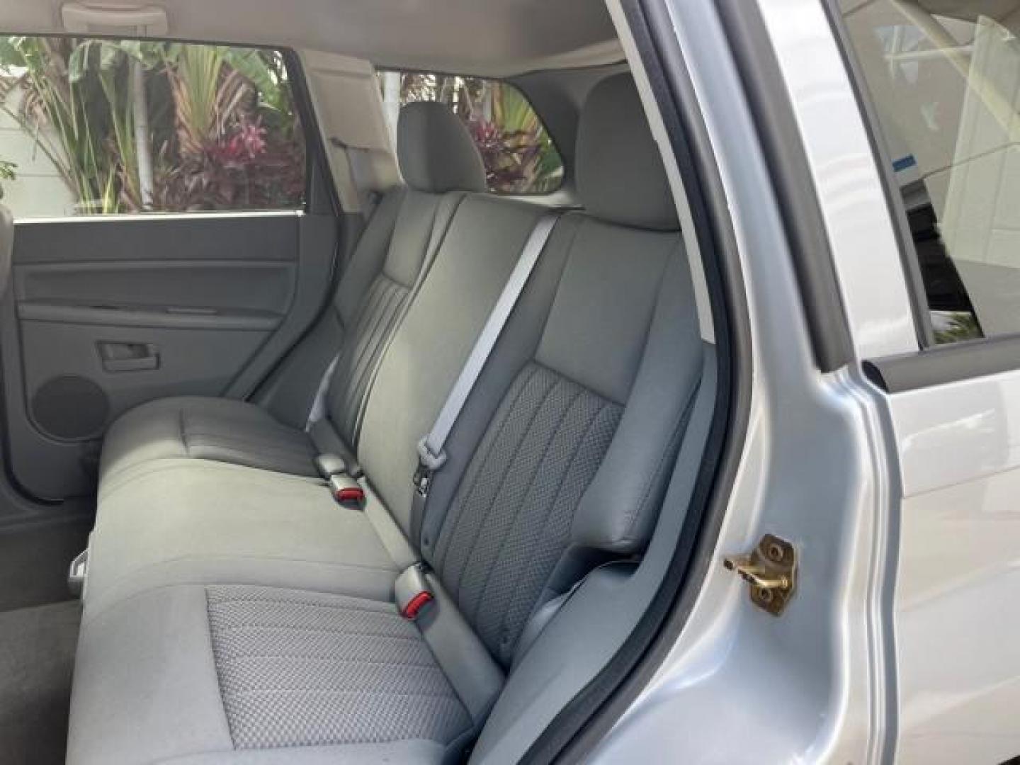 2006 Bright Silver Metallic /Medium Slate Gray Jeep Grand Cherokee 1 FL Laredo LOW MILES 57,272 (1J4GS48K06C) with an 3.7L V6 Engine engine, Automatic transmission, located at 4701 North Dixie Hwy, Pompano Beach, FL, 33064, (954) 422-2889, 26.240938, -80.123474 - OUR WEBPAGE FLORIDACARS1.COM HAS OVER 100 PHOTOS AND FREE CARFAX LINK 2006 JEEP GRAND CHEROKEE LAREDO ROAD READY 3.7L V6 VIN: 1J4GS48K06C160709 NO ACCIDENTS 4 DOOR WAGON/SPORT UTILITY NO RECALLS 3.7L V6 F 1 OWNER FLORIDA GASOLINE LOW MILES 57,272 REAR WHEEL DRIVE POWER SEATS/MIRRORS Active Head Rest - Photo#49