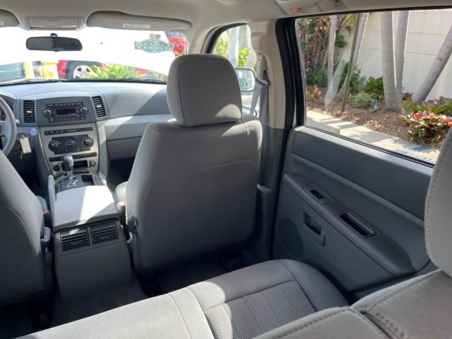 2006 Bright Silver Metallic /Medium Slate Gray Jeep Grand Cherokee 1 FL Laredo LOW MILES 57,272 (1J4GS48K06C) with an 3.7L V6 Engine engine, Automatic transmission, located at 4701 North Dixie Hwy, Pompano Beach, FL, 33064, (954) 422-2889, 26.240938, -80.123474 - OUR WEBPAGE FLORIDACARS1.COM HAS OVER 100 PHOTOS AND FREE CARFAX LINK 2006 JEEP GRAND CHEROKEE LAREDO ROAD READY 3.7L V6 VIN: 1J4GS48K06C160709 NO ACCIDENTS 4 DOOR WAGON/SPORT UTILITY NO RECALLS 3.7L V6 F 1 OWNER FLORIDA GASOLINE LOW MILES 57,272 REAR WHEEL DRIVE POWER SEATS/MIRRORS Active Head Rest - Photo#77