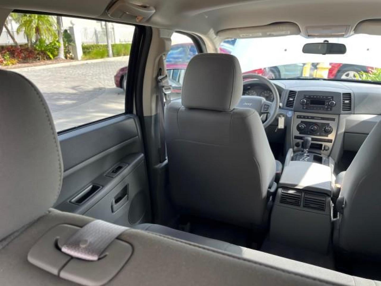 2006 Bright Silver Metallic /Medium Slate Gray Jeep Grand Cherokee 1 FL Laredo LOW MILES 57,272 (1J4GS48K06C) with an 3.7L V6 Engine engine, Automatic transmission, located at 4701 North Dixie Hwy, Pompano Beach, FL, 33064, (954) 422-2889, 26.240938, -80.123474 - OUR WEBPAGE FLORIDACARS1.COM HAS OVER 100 PHOTOS AND FREE CARFAX LINK 2006 JEEP GRAND CHEROKEE LAREDO ROAD READY 3.7L V6 VIN: 1J4GS48K06C160709 NO ACCIDENTS 4 DOOR WAGON/SPORT UTILITY NO RECALLS 3.7L V6 F 1 OWNER FLORIDA GASOLINE LOW MILES 57,272 REAR WHEEL DRIVE POWER SEATS/MIRRORS Active Head Rest - Photo#78