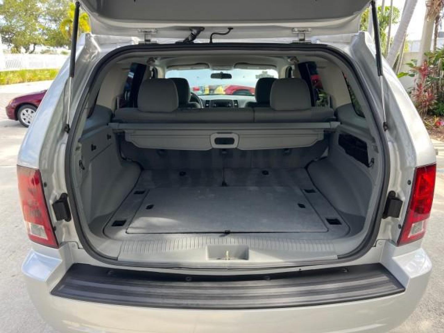 2006 Bright Silver Metallic /Medium Slate Gray Jeep Grand Cherokee 1 FL Laredo LOW MILES 57,272 (1J4GS48K06C) with an 3.7L V6 Engine engine, Automatic transmission, located at 4701 North Dixie Hwy, Pompano Beach, FL, 33064, (954) 422-2889, 26.240938, -80.123474 - OUR WEBPAGE FLORIDACARS1.COM HAS OVER 100 PHOTOS AND FREE CARFAX LINK 2006 JEEP GRAND CHEROKEE LAREDO ROAD READY 3.7L V6 VIN: 1J4GS48K06C160709 NO ACCIDENTS 4 DOOR WAGON/SPORT UTILITY NO RECALLS 3.7L V6 F 1 OWNER FLORIDA GASOLINE LOW MILES 57,272 REAR WHEEL DRIVE POWER SEATS/MIRRORS Active Head Rest - Photo#83