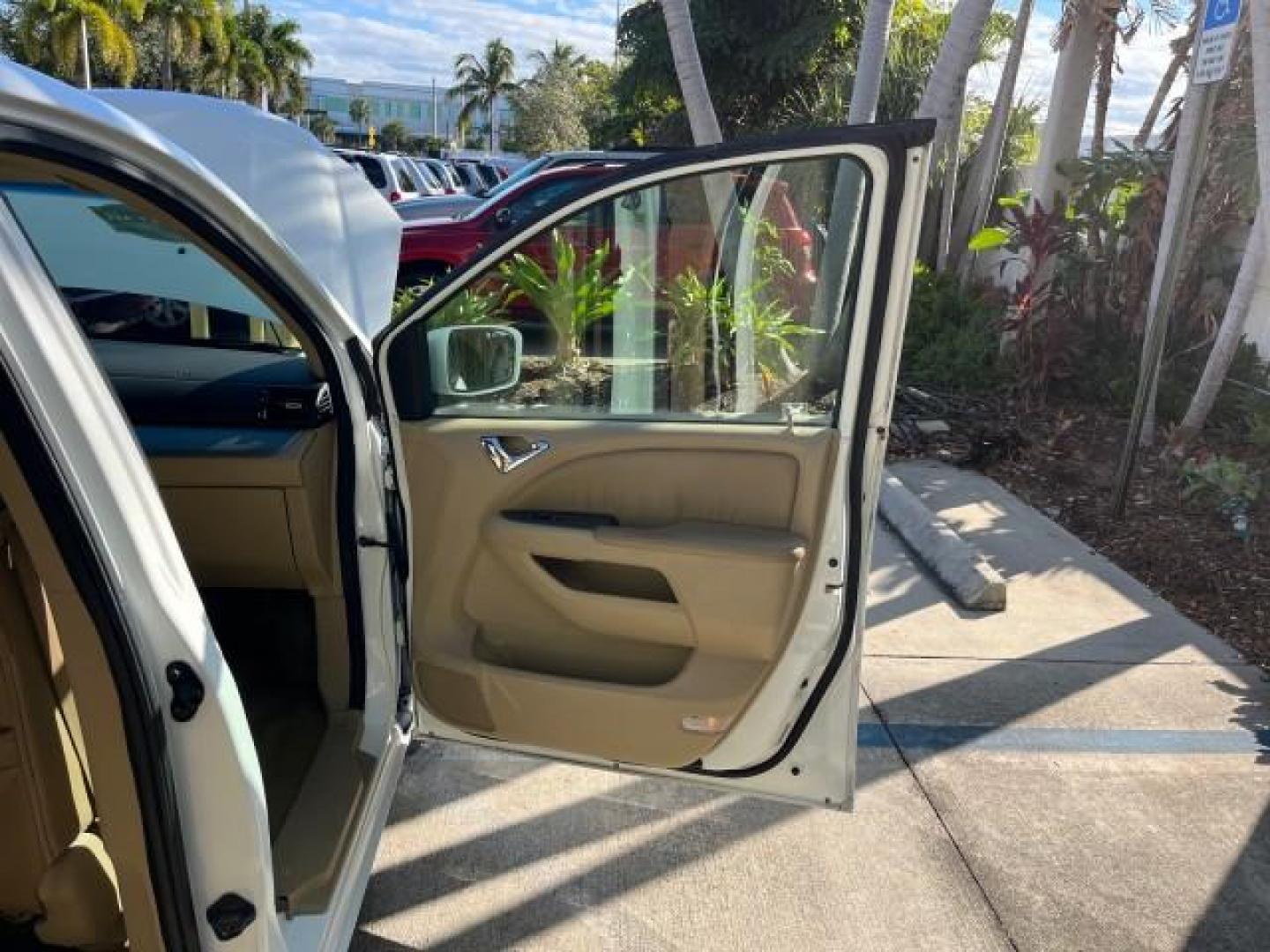 2010 Taffeta White /Ivory Honda Odyssey EX-L LOW MILES 78,635 (5FNRL3H73AB) with an 3.5L V6 Cylinder Engine engine, Automatic transmission, located at 4701 North Dixie Hwy, Pompano Beach, FL, 33064, (954) 422-2889, 26.240938, -80.123474 - OUR WEBPAGE FLORIDACARS1.COM HAS OVER 100 PHOTOS AND FREE CARFAX LINK 2010 HONDA ODYSSEY EX-L W/DVD ROAD READY 3.5L V6 25 MPG VIN: 5FNRL3H73AB055515 NO ACCIDENTS NO RECALLS VAN FLORIDA OWNER SUNROOF 3.5L V6 F SOHC 24V BACK UP CAMERA POWER SLIDING DOORS DVD GASOLINE LOW MILES 78,635 3 ROW POWER LEATH - Photo#11