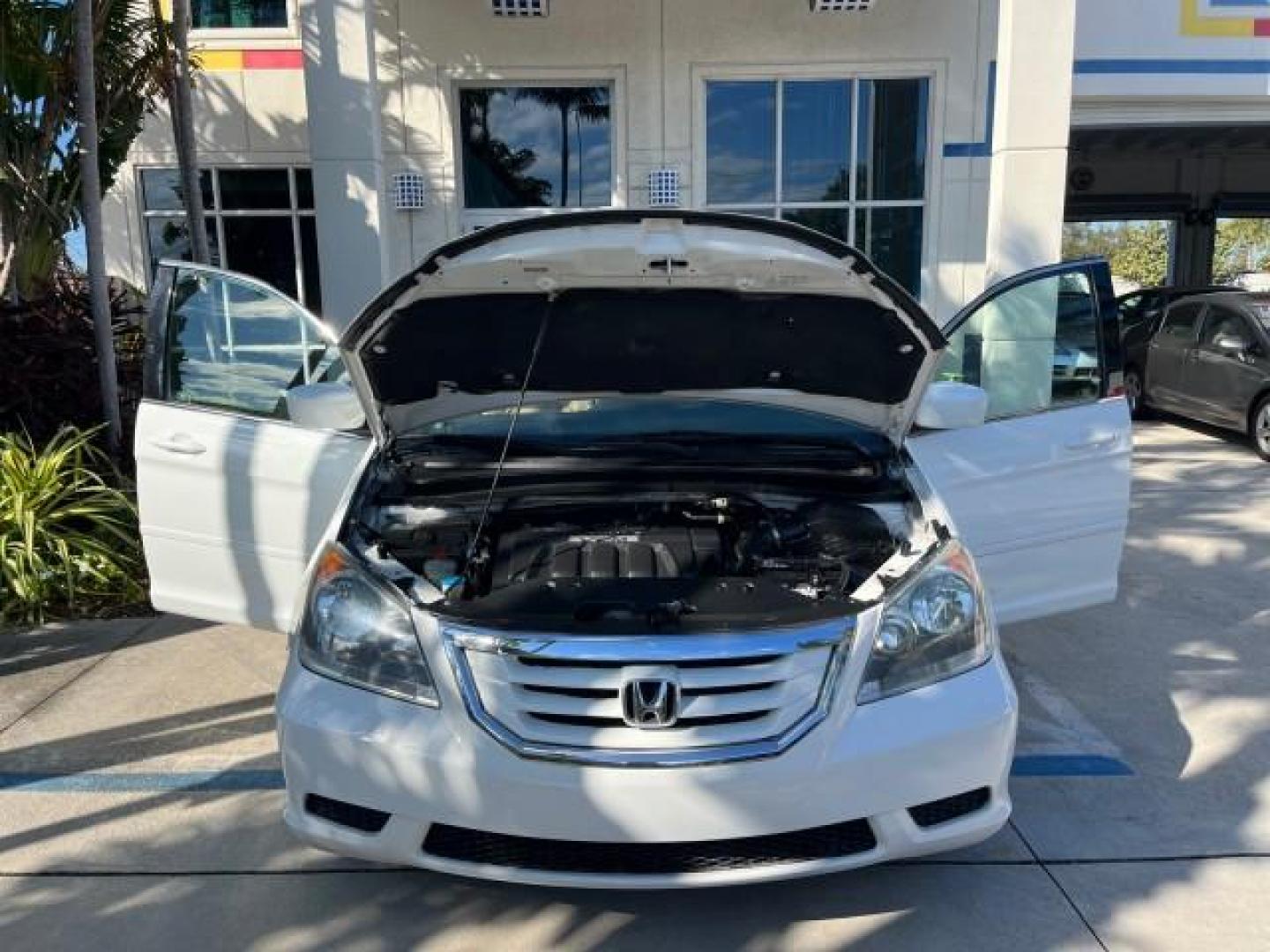 2010 Taffeta White /Ivory Honda Odyssey EX-L LOW MILES 78,635 (5FNRL3H73AB) with an 3.5L V6 Cylinder Engine engine, Automatic transmission, located at 4701 North Dixie Hwy, Pompano Beach, FL, 33064, (954) 422-2889, 26.240938, -80.123474 - OUR WEBPAGE FLORIDACARS1.COM HAS OVER 100 PHOTOS AND FREE CARFAX LINK 2010 HONDA ODYSSEY EX-L W/DVD ROAD READY 3.5L V6 25 MPG VIN: 5FNRL3H73AB055515 NO ACCIDENTS NO RECALLS VAN FLORIDA OWNER SUNROOF 3.5L V6 F SOHC 24V BACK UP CAMERA POWER SLIDING DOORS DVD GASOLINE LOW MILES 78,635 3 ROW POWER LEATH - Photo#16