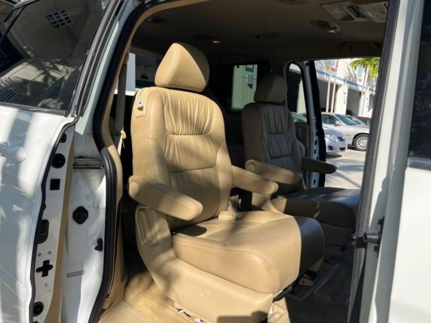 2010 Taffeta White /Ivory Honda Odyssey EX-L LOW MILES 78,635 (5FNRL3H73AB) with an 3.5L V6 Cylinder Engine engine, Automatic transmission, located at 4701 North Dixie Hwy, Pompano Beach, FL, 33064, (954) 422-2889, 26.240938, -80.123474 - OUR WEBPAGE FLORIDACARS1.COM HAS OVER 100 PHOTOS AND FREE CARFAX LINK 2010 HONDA ODYSSEY EX-L W/DVD ROAD READY 3.5L V6 25 MPG VIN: 5FNRL3H73AB055515 NO ACCIDENTS NO RECALLS VAN FLORIDA OWNER SUNROOF 3.5L V6 F SOHC 24V BACK UP CAMERA POWER SLIDING DOORS DVD GASOLINE LOW MILES 78,635 3 ROW POWER LEATH - Photo#30