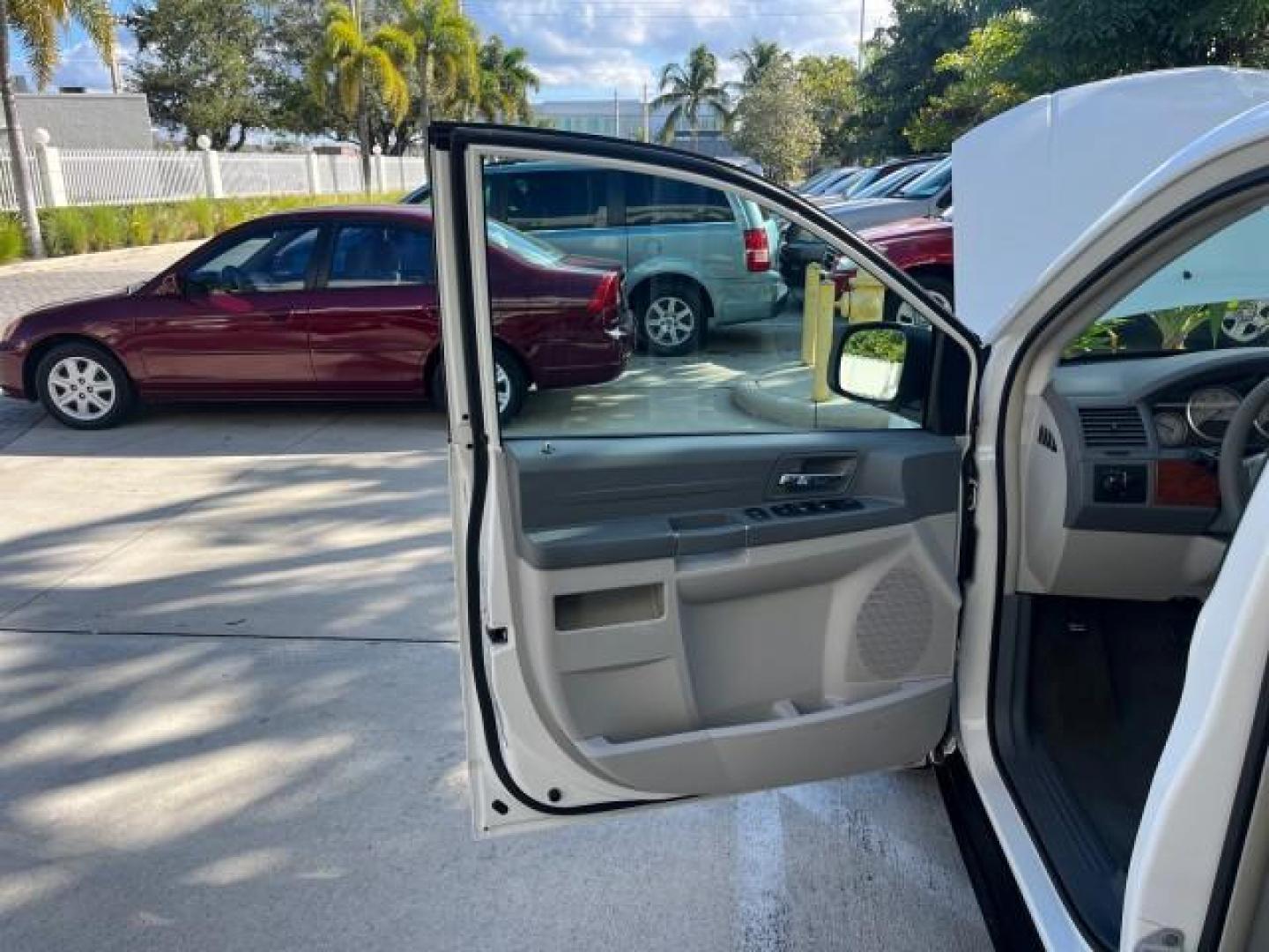 2009 Stone White /Md Slate Gray/Lt Shale Chrysler Town and Country LX LOW MILES 51,598 (2A8HR44E89R) with an 3.3L OHV SMPI V6 Engine engine, Automatic transmission, located at 4701 North Dixie Hwy, Pompano Beach, FL, 33064, (954) 422-2889, 26.240938, -80.123474 - OUR WEBPAGE FLORIDACARS1.COM HAS OVER 100 PHOTOS AND FREE CARFAX LINK 2009 CHRYSLER TOWN AND COUNTRY LX ROAD READY 3.3L V6 VIN: 2A8HR44E89R547339 NO ACCIDENTS 24 MPG VAN FLORIDA OWNER 3.3L V6 F OHV 12V 3 ROW SEATS GASOLINE LOW MILES 51,598 FRONT WHEEL DRIVE POWER MIRRORS Anti-Theft System Approach L - Photo#9