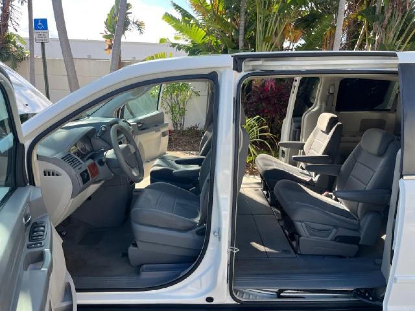 2009 Stone White /Md Slate Gray/Lt Shale Chrysler Town and Country LX LOW MILES 51,598 (2A8HR44E89R) with an 3.3L OHV SMPI V6 Engine engine, Automatic transmission, located at 4701 North Dixie Hwy, Pompano Beach, FL, 33064, (954) 422-2889, 26.240938, -80.123474 - OUR WEBPAGE FLORIDACARS1.COM HAS OVER 100 PHOTOS AND FREE CARFAX LINK 2009 CHRYSLER TOWN AND COUNTRY LX ROAD READY 3.3L V6 VIN: 2A8HR44E89R547339 NO ACCIDENTS 24 MPG VAN FLORIDA OWNER 3.3L V6 F OHV 12V 3 ROW SEATS GASOLINE LOW MILES 51,598 FRONT WHEEL DRIVE POWER MIRRORS Anti-Theft System Approach L - Photo#10