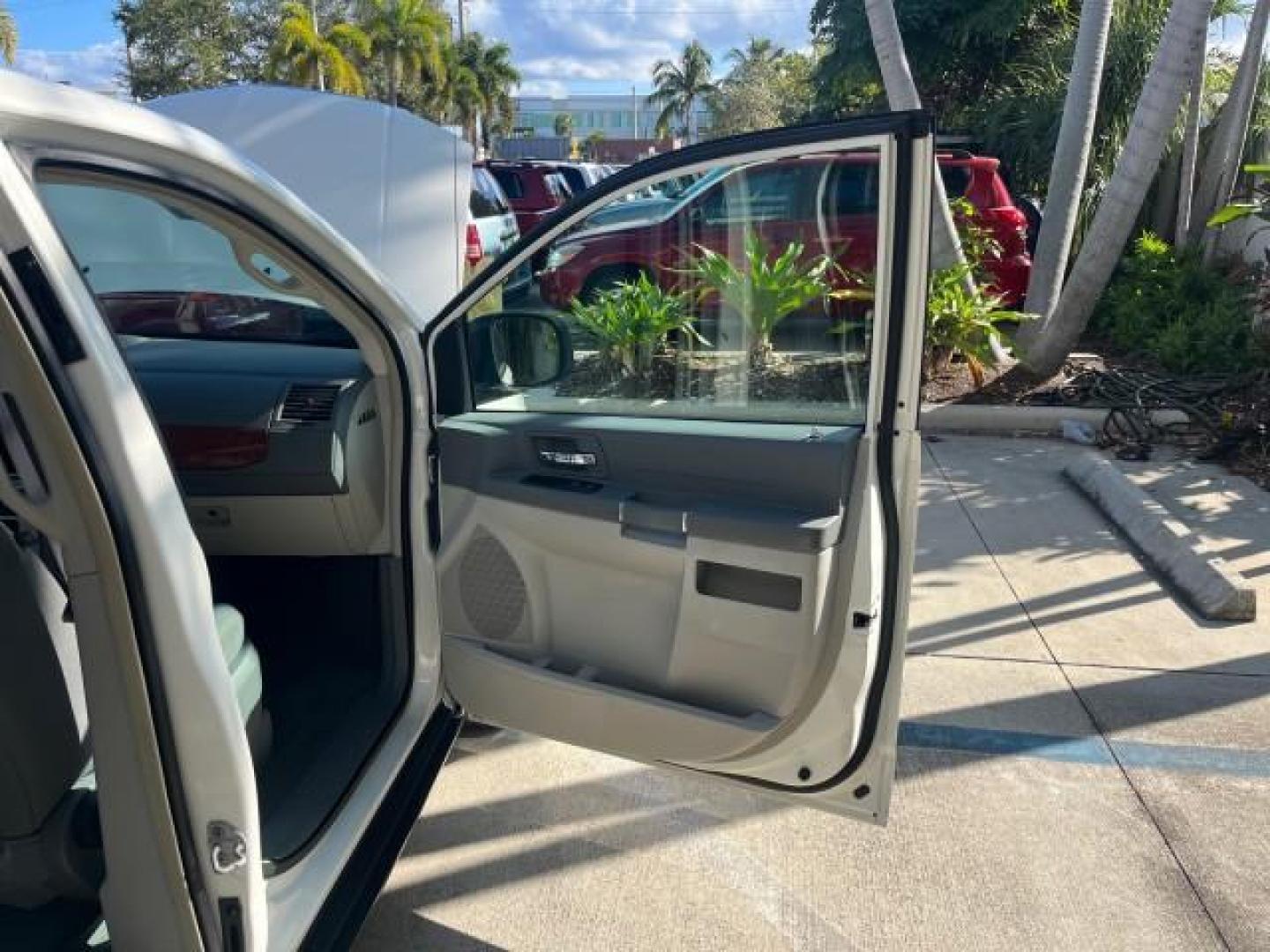 2009 Stone White /Md Slate Gray/Lt Shale Chrysler Town and Country LX LOW MILES 51,598 (2A8HR44E89R) with an 3.3L OHV SMPI V6 Engine engine, Automatic transmission, located at 4701 North Dixie Hwy, Pompano Beach, FL, 33064, (954) 422-2889, 26.240938, -80.123474 - OUR WEBPAGE FLORIDACARS1.COM HAS OVER 100 PHOTOS AND FREE CARFAX LINK 2009 CHRYSLER TOWN AND COUNTRY LX ROAD READY 3.3L V6 VIN: 2A8HR44E89R547339 NO ACCIDENTS 24 MPG VAN FLORIDA OWNER 3.3L V6 F OHV 12V 3 ROW SEATS GASOLINE LOW MILES 51,598 FRONT WHEEL DRIVE POWER MIRRORS Anti-Theft System Approach L - Photo#11