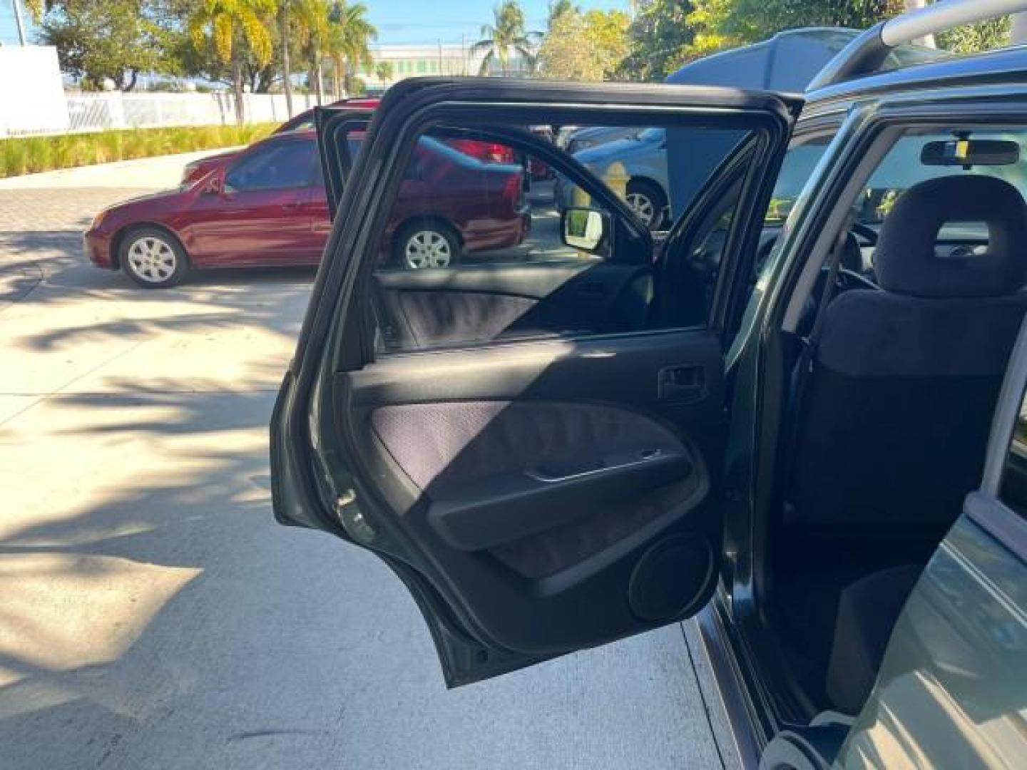 2004 Lofty Green Pearl /Charcoal Mitsubishi Outlander XLS LOW MILES 38,372 (JA4LX41F44U) with an 2.4L SOHC SMPI 16-Valve I4 Engine engine, Automatic transmission, located at 4701 North Dixie Hwy, Pompano Beach, FL, 33064, (954) 422-2889, 26.240938, -80.123474 - OUR WEBPAGE FLORIDACARS1.COM HAS OVER 100 PHOTOS AND FREE CARFAX LINK 2004 MITSUBISHI OUTLANDER XLS ROAD READY 2.4L I4 VIN: JA4LX41F44U045177 NO ACCIDENTS 27 MPG DOOR WAGON/SPORT UTILITY NO RECALLS 2.4L I4 F SOHC FLORIDA OWNER GASOLINE LOW MILES 38,372 FRONT WHEEL DRIVE 10 SERVICE RECORDS Alloy Whee - Photo#13