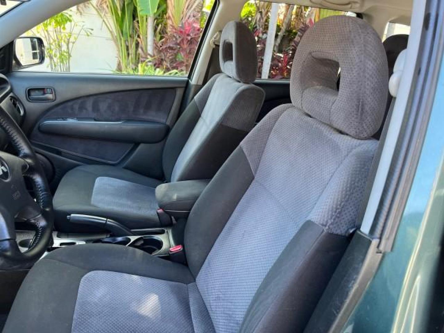 2004 Lofty Green Pearl /Charcoal Mitsubishi Outlander XLS LOW MILES 38,372 (JA4LX41F44U) with an 2.4L SOHC SMPI 16-Valve I4 Engine engine, Automatic transmission, located at 4701 North Dixie Hwy, Pompano Beach, FL, 33064, (954) 422-2889, 26.240938, -80.123474 - OUR WEBPAGE FLORIDACARS1.COM HAS OVER 100 PHOTOS AND FREE CARFAX LINK 2004 MITSUBISHI OUTLANDER XLS ROAD READY 2.4L I4 VIN: JA4LX41F44U045177 NO ACCIDENTS 27 MPG DOOR WAGON/SPORT UTILITY NO RECALLS 2.4L I4 F SOHC FLORIDA OWNER GASOLINE LOW MILES 38,372 FRONT WHEEL DRIVE 10 SERVICE RECORDS Alloy Whee - Photo#44